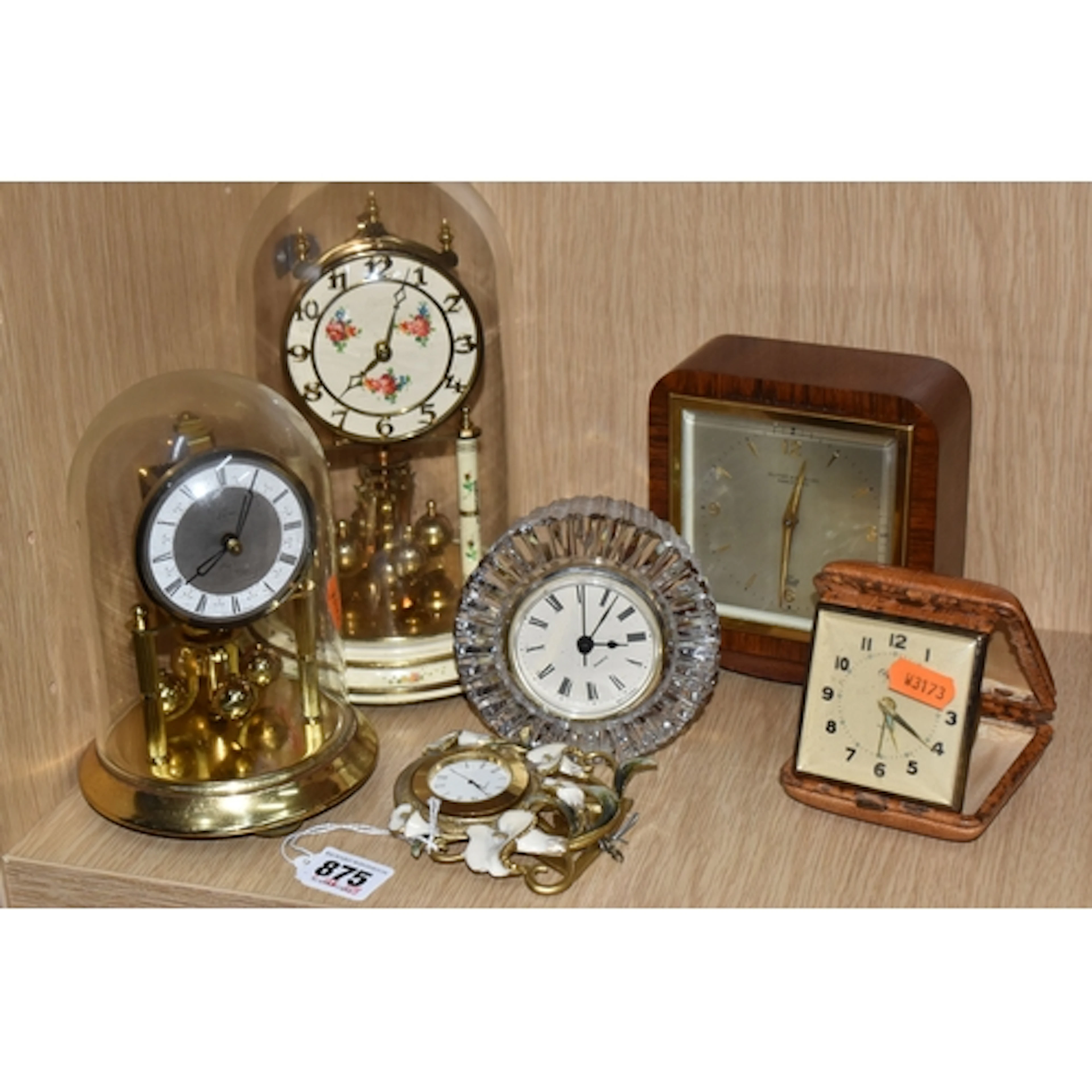 A GROUP OF SIX CLOCKS, comprising a wooden cased Elliott man...