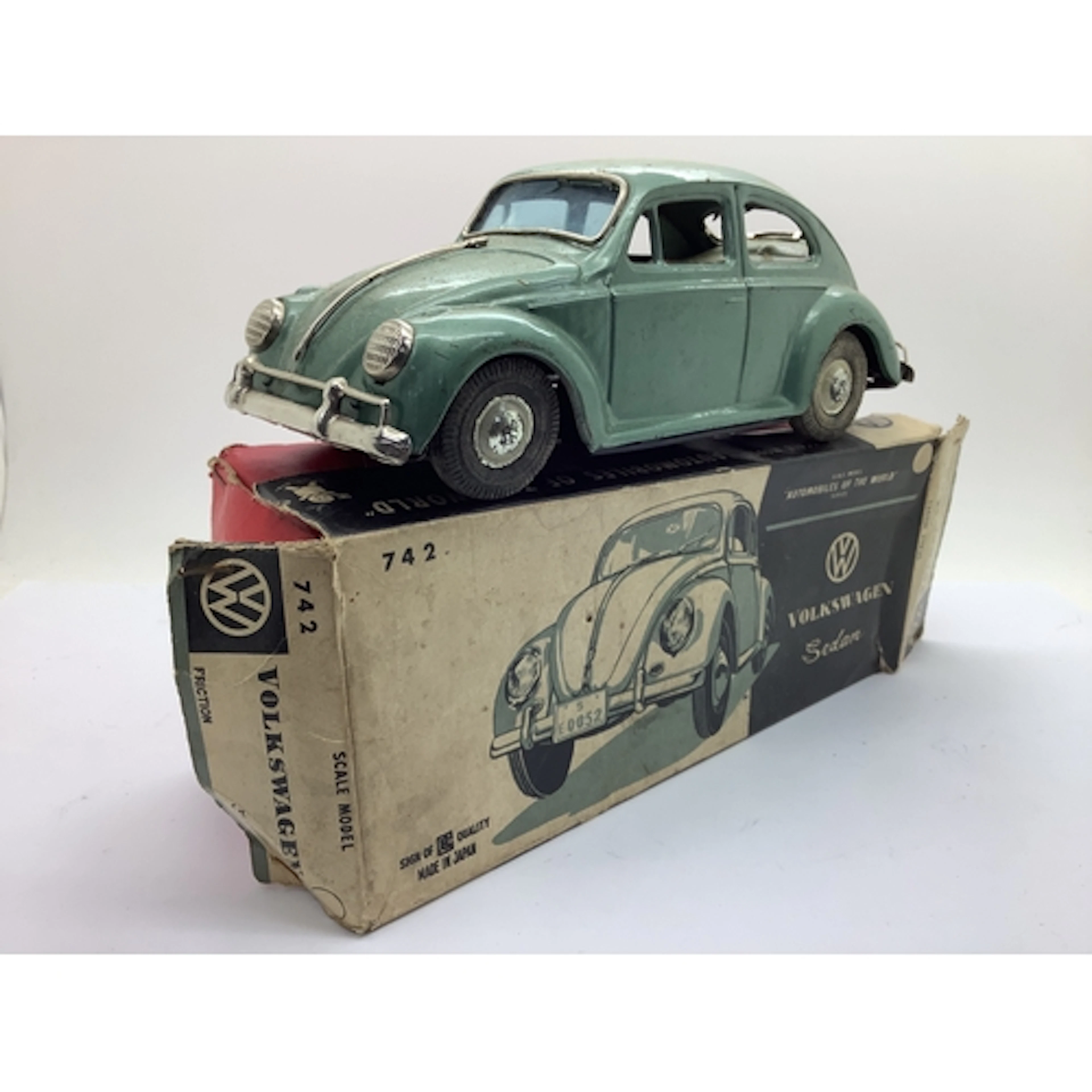 A 1960s Japanese Tinplate Volkswagen Beetle 'Sedan', by Band...
