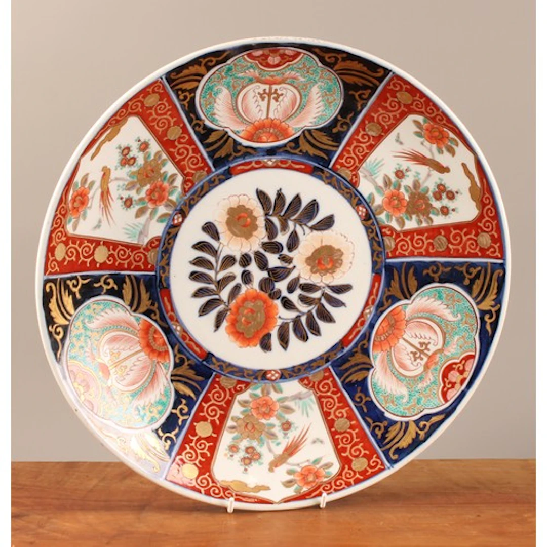 A Japanese circular charger, painted in the Imari palette an...