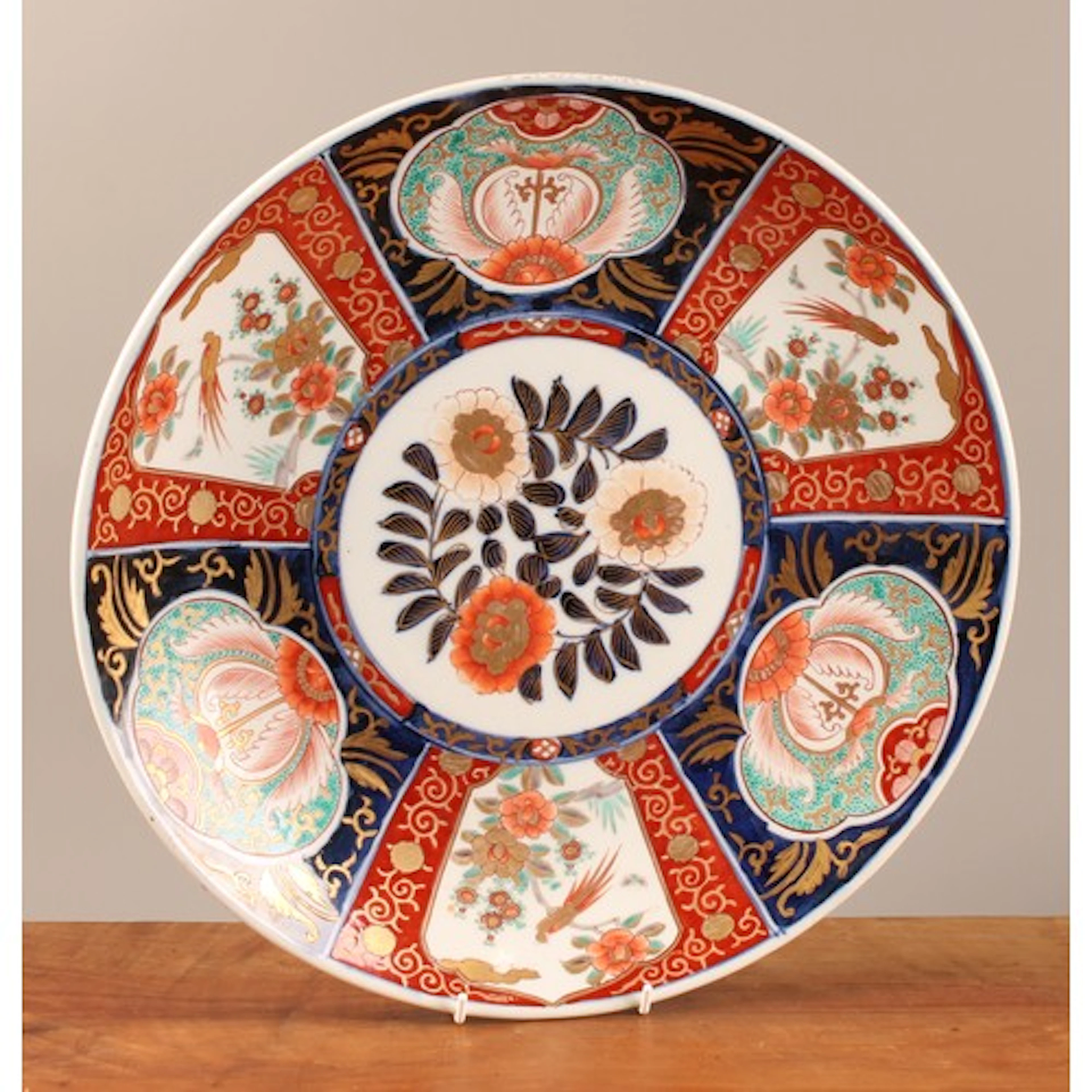 A Japanese circular charger, painted in the Imari palette an...
