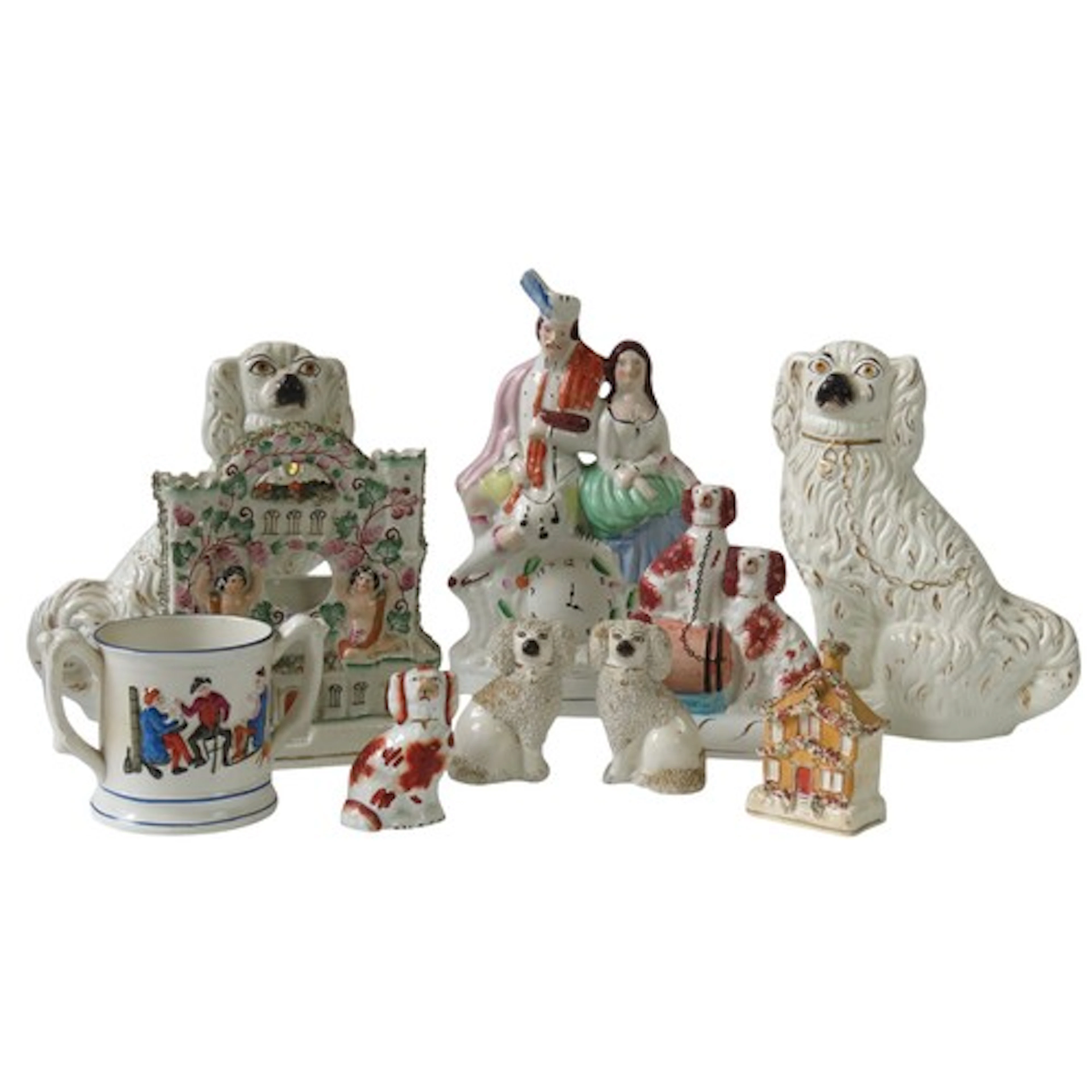 A MIXED GROUP OF 19TH CENTURY STAFFORDSHIRE SPANIELS, WATCH ...