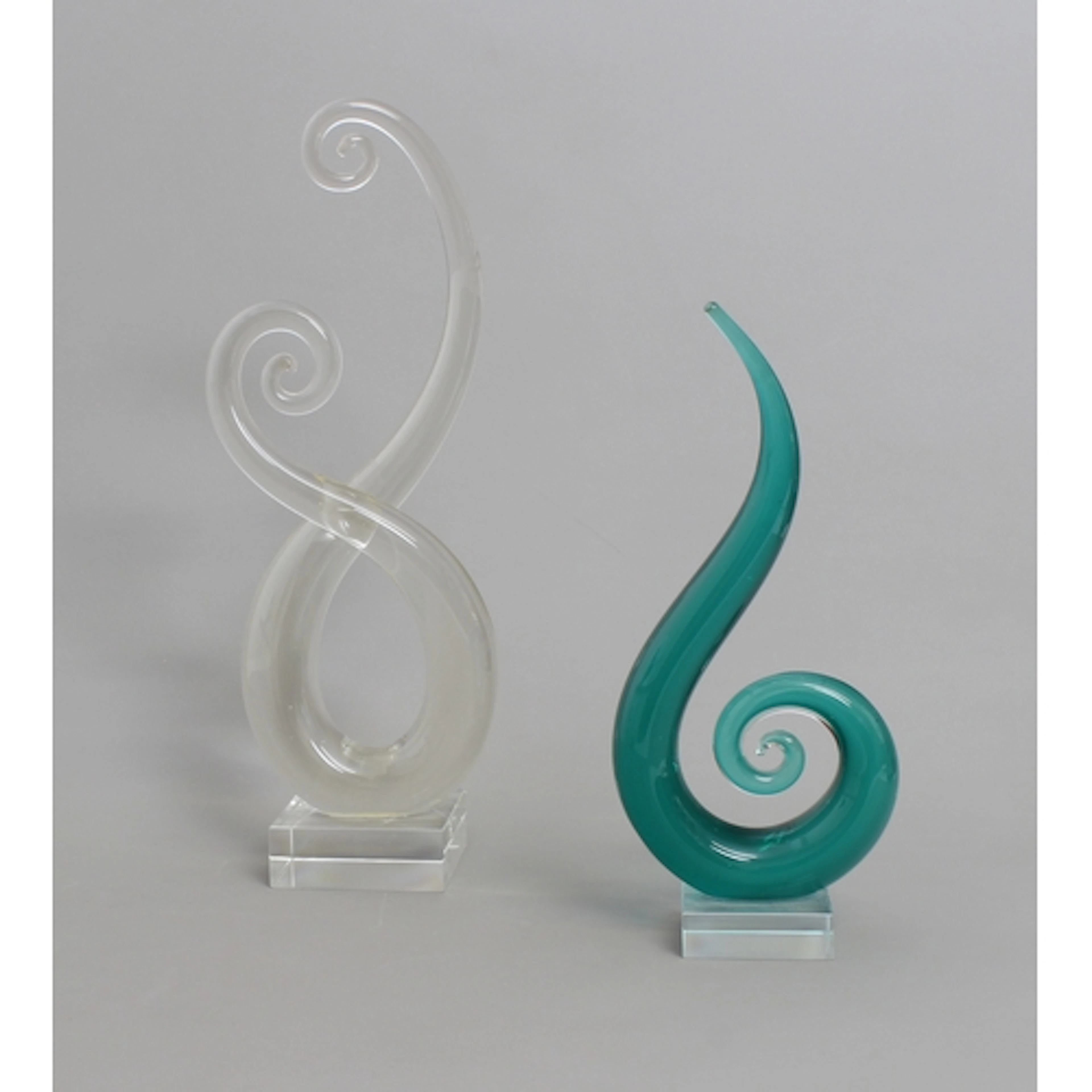 Two Murano style art glass sculptures - of swirl design on s...