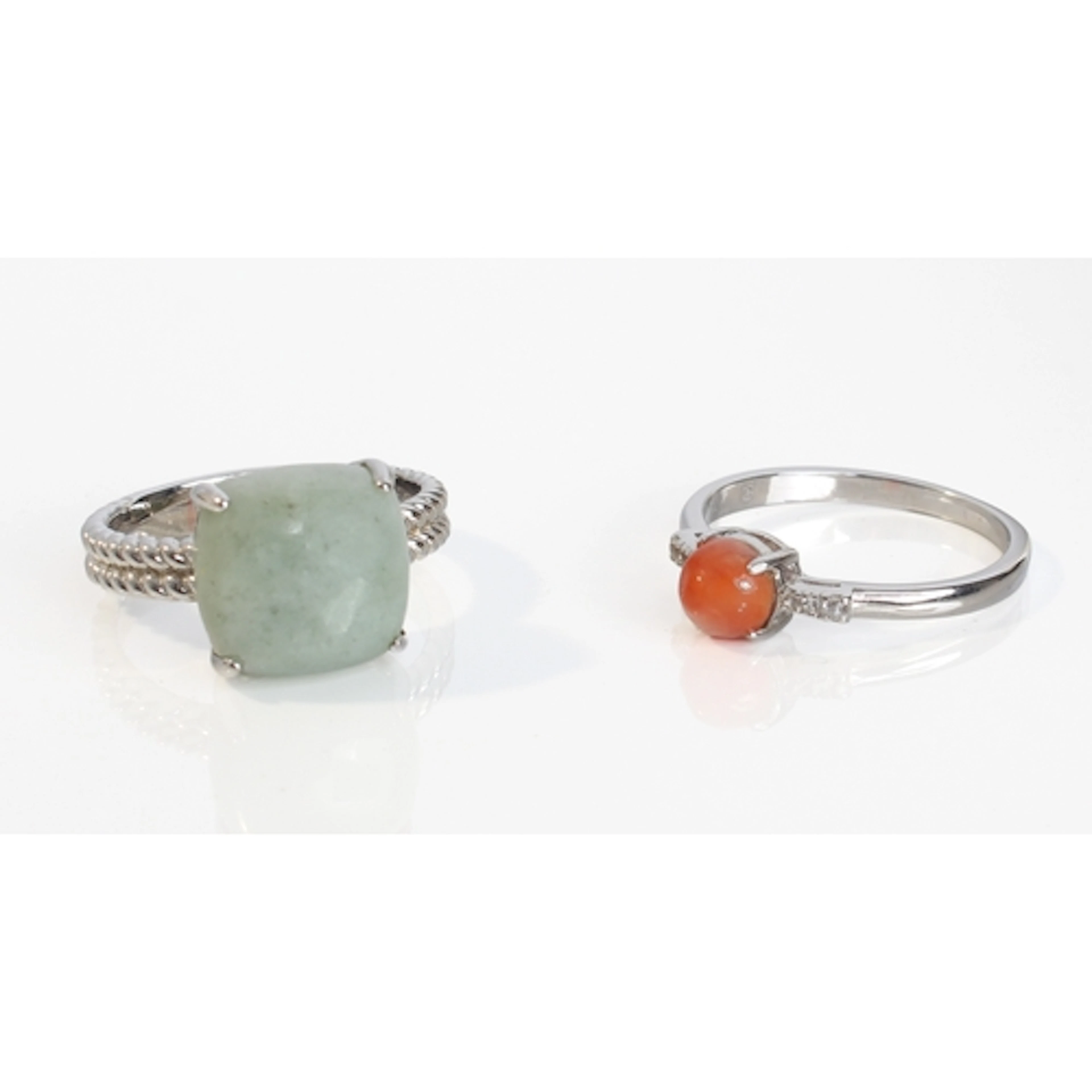 Two sterling silver and jade / jadeite rings - comprising a ...