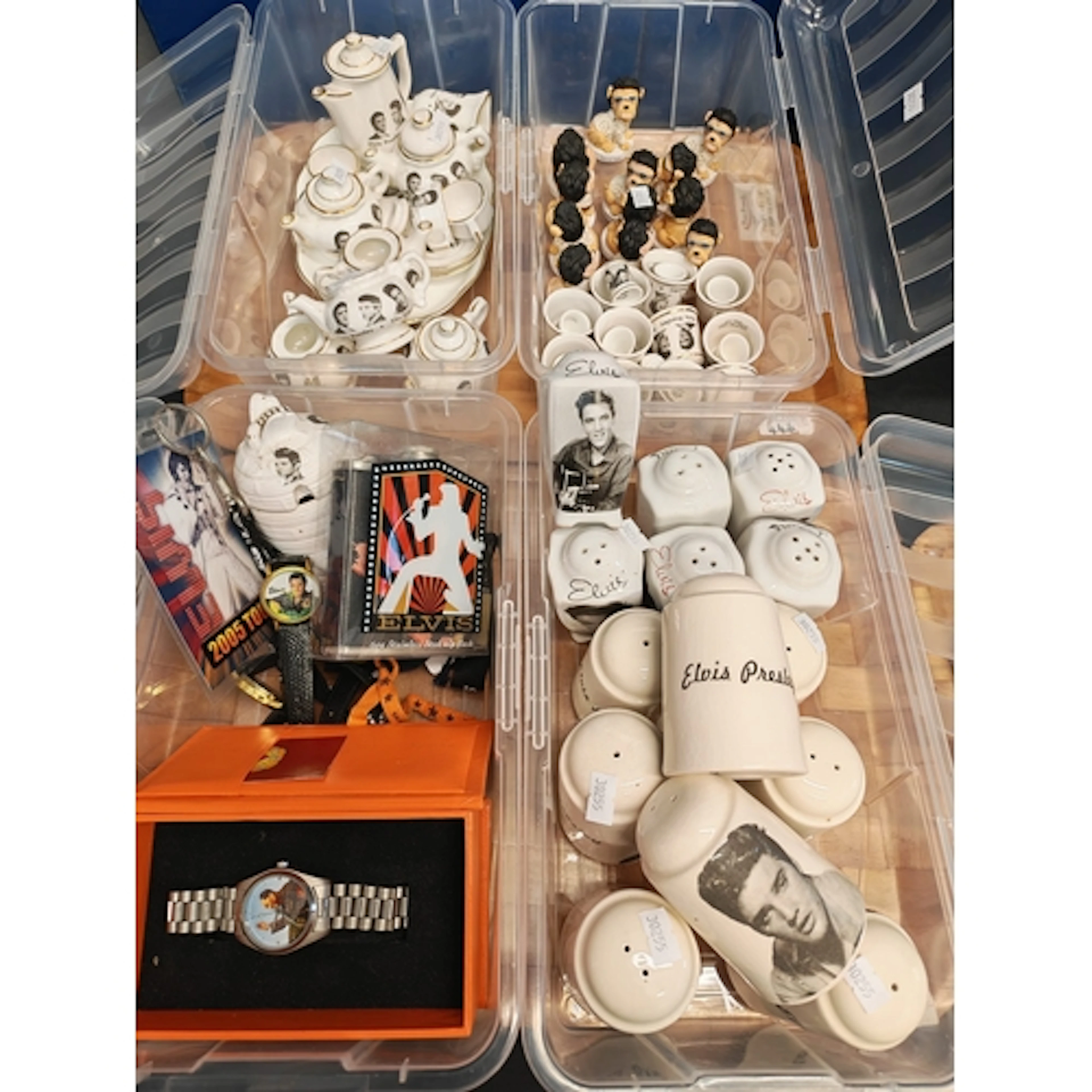 Two trays of Elvis Presley memorabilia to include: dress wat...