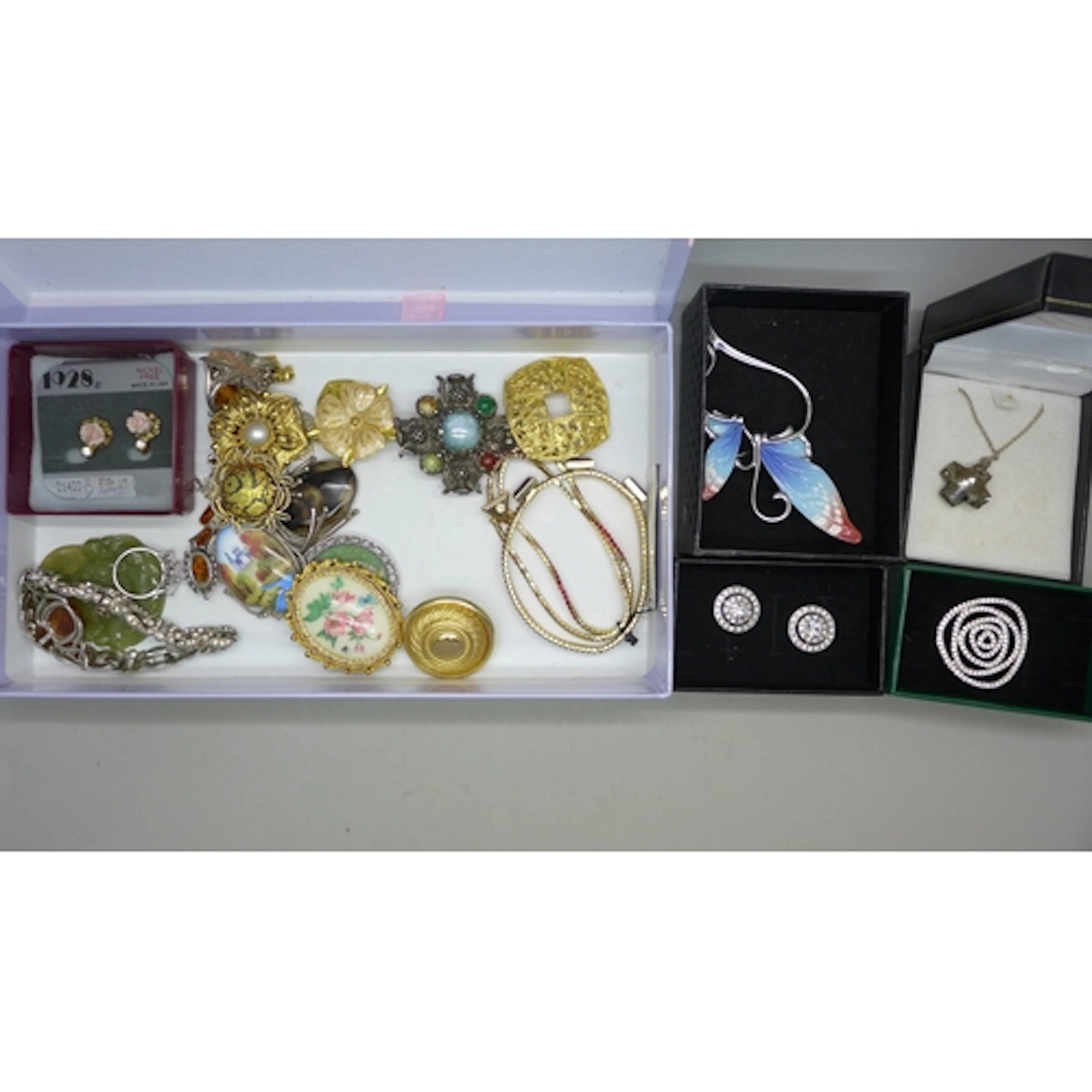 A collection of jewellery including Franz brooch, Monet earr...