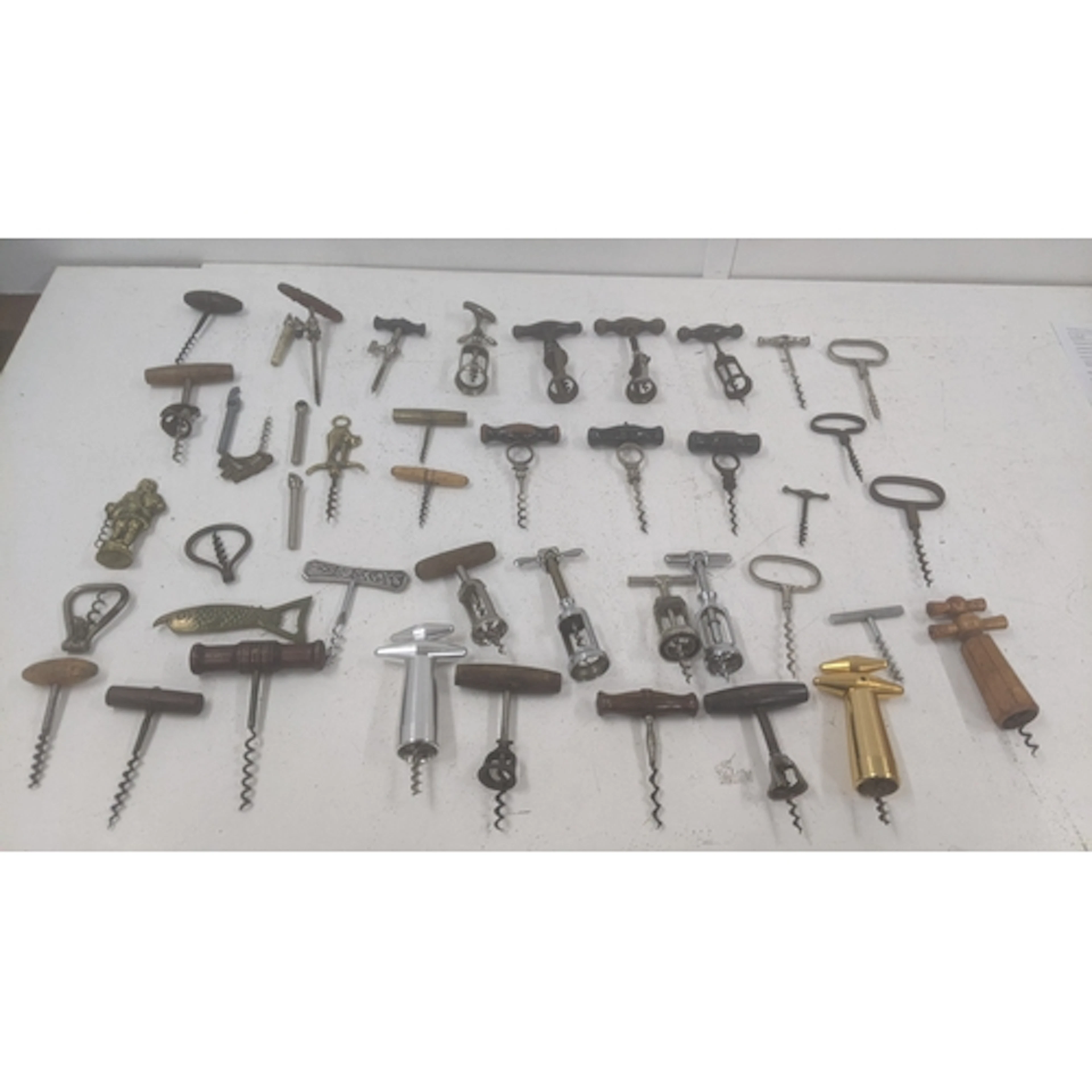 A collection of vintage corkscrews to include ring pull exam...