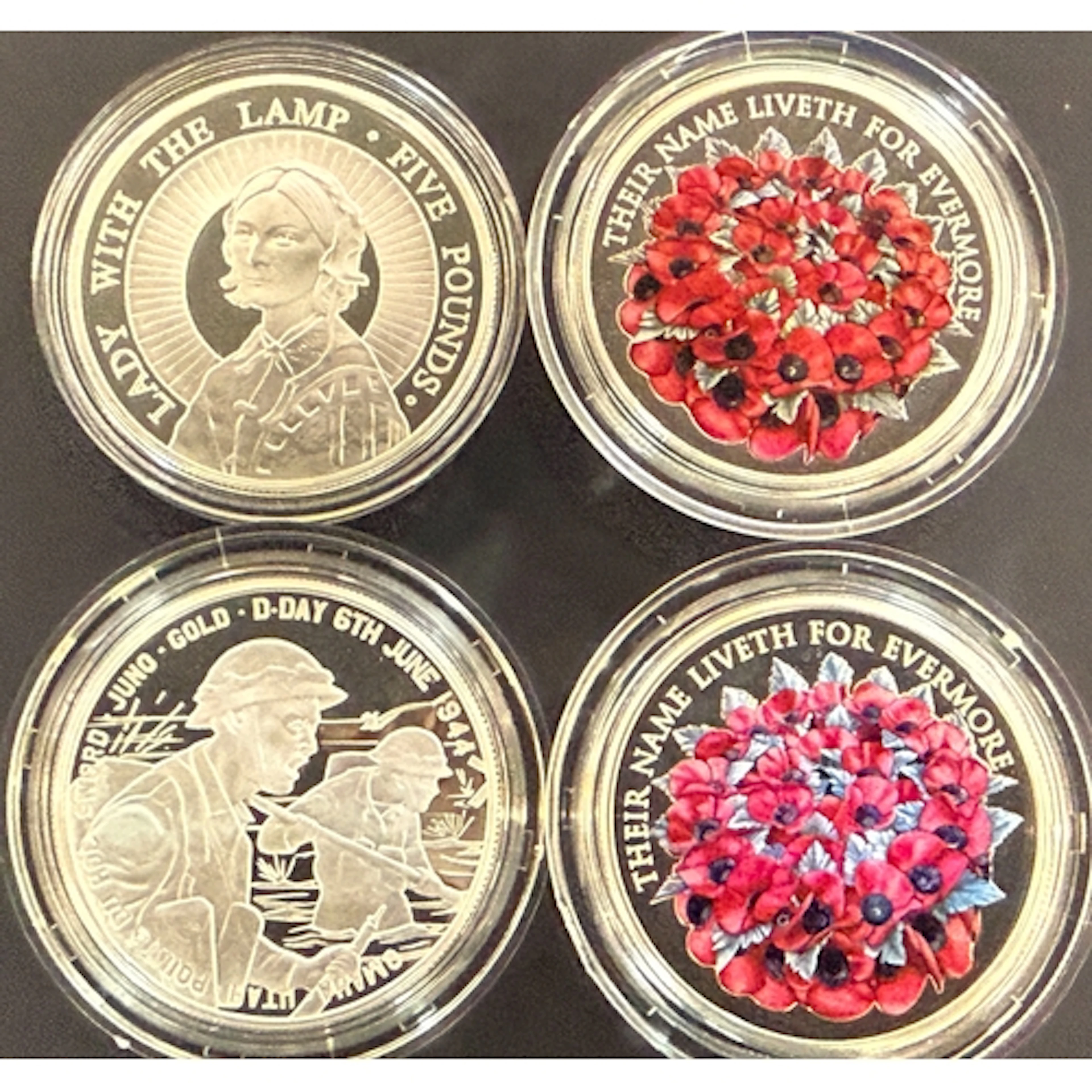 A group of four Alderney silver proof coins, comprising 2004...