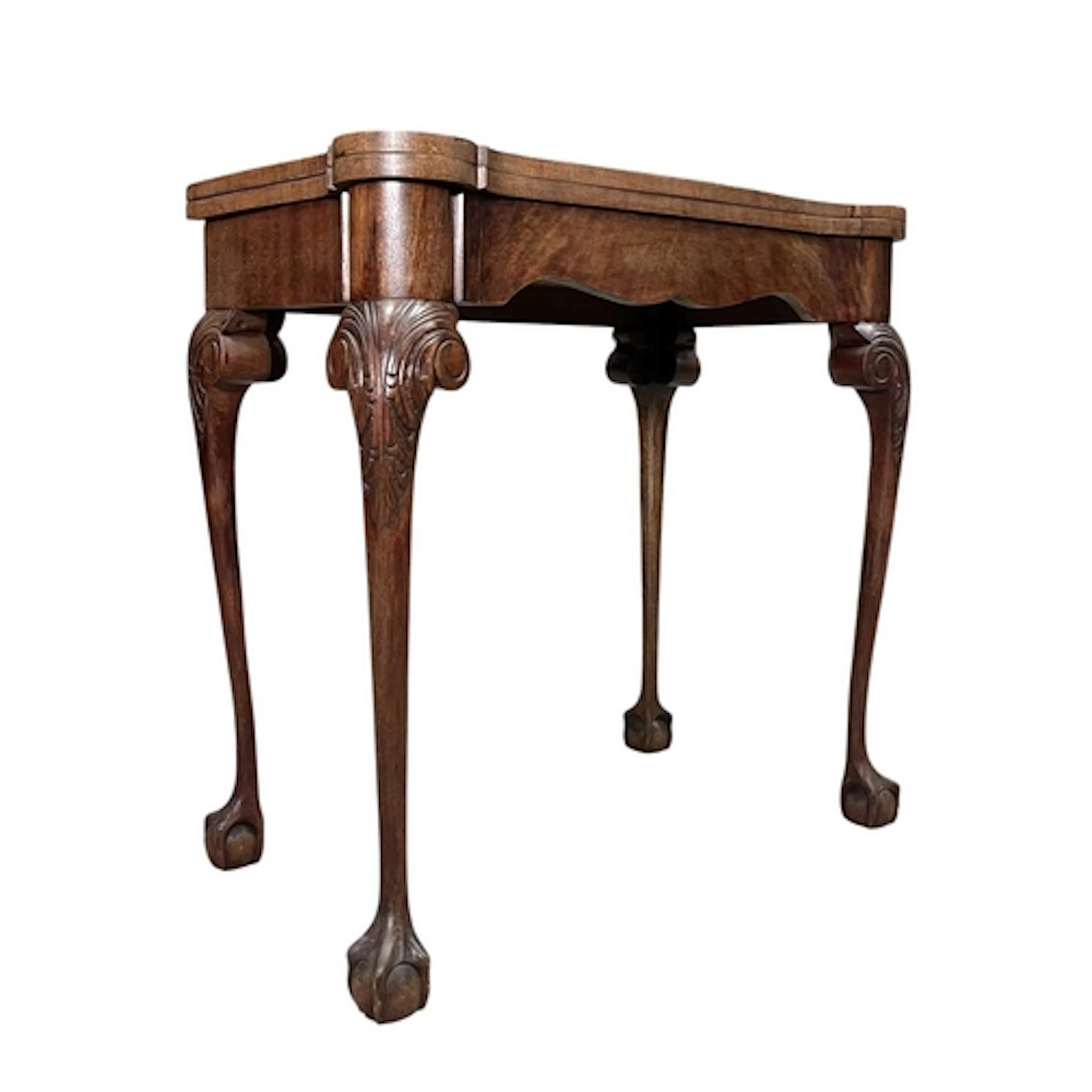 A 19th century mahogany fold out card games table. The table...