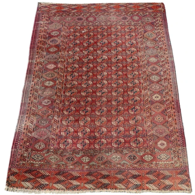 TEKKE CARPET, EMIRATE OF BUKHARA, CIRCA 1900. The madder fie...