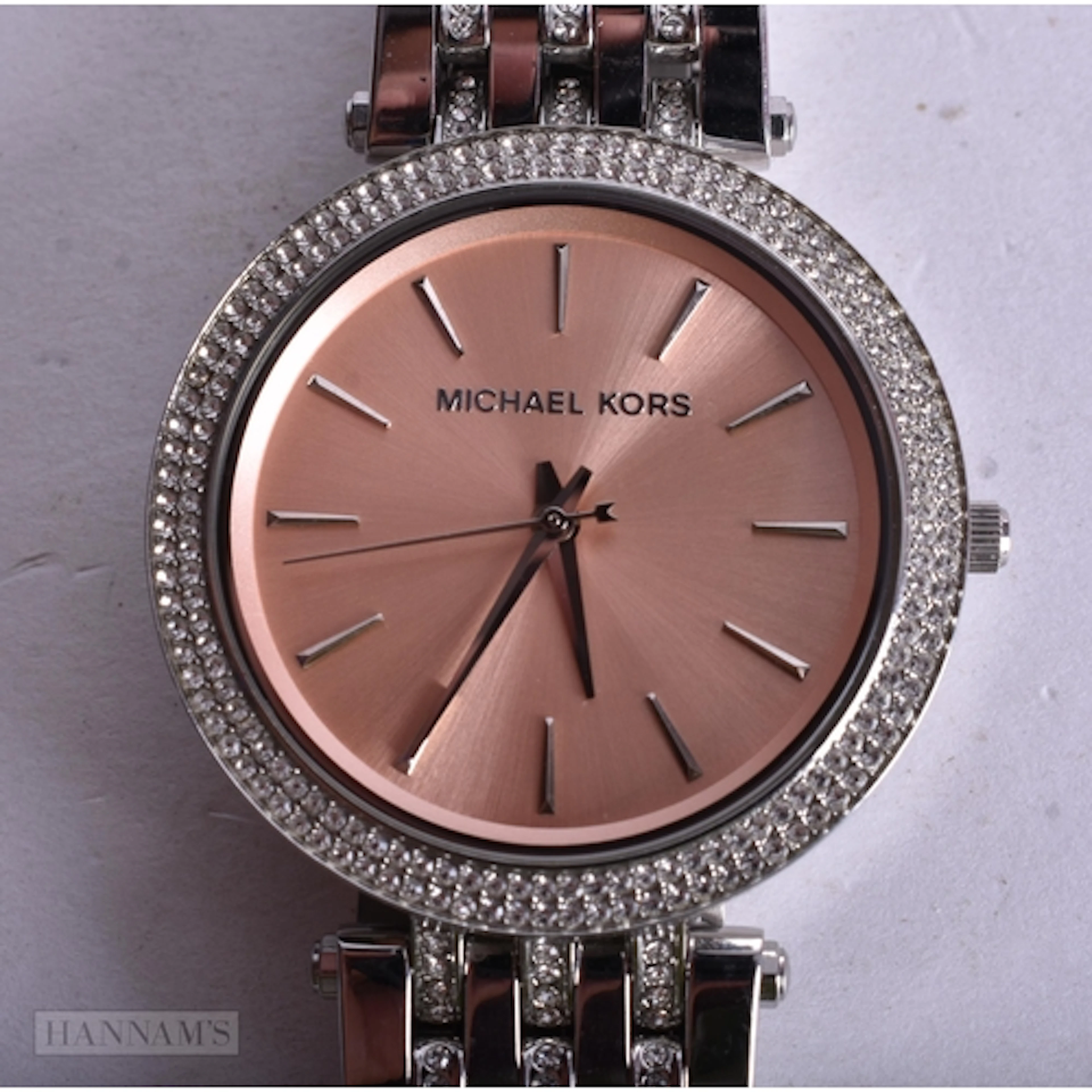 A MICHAEL KORS WRISTWATCH. Untested. 4 cm wide.