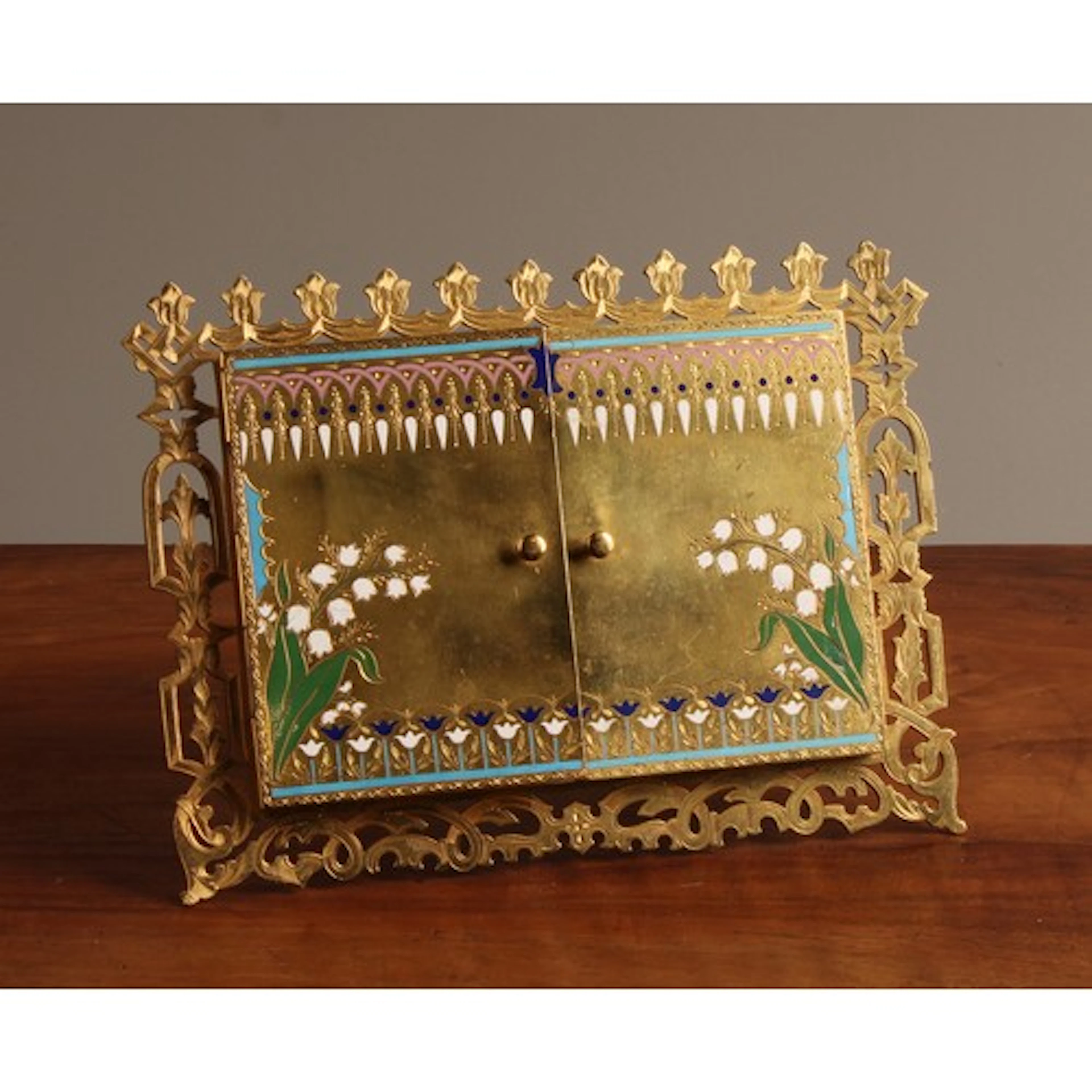 A 19th century gilt brass and enamel enclosed twin-section e...