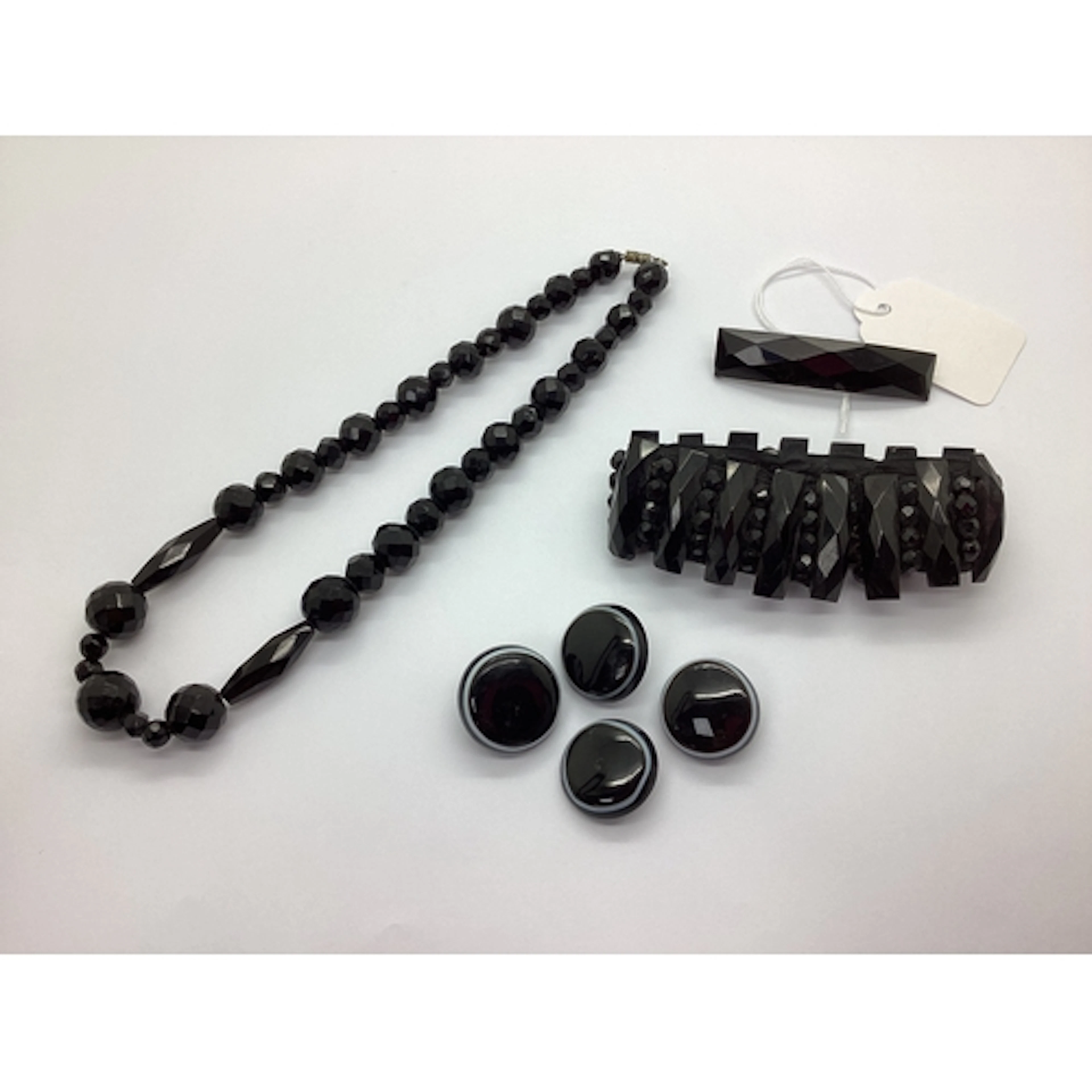 Four Bullseye Agate Circular Buttons, each approximately 2.5...