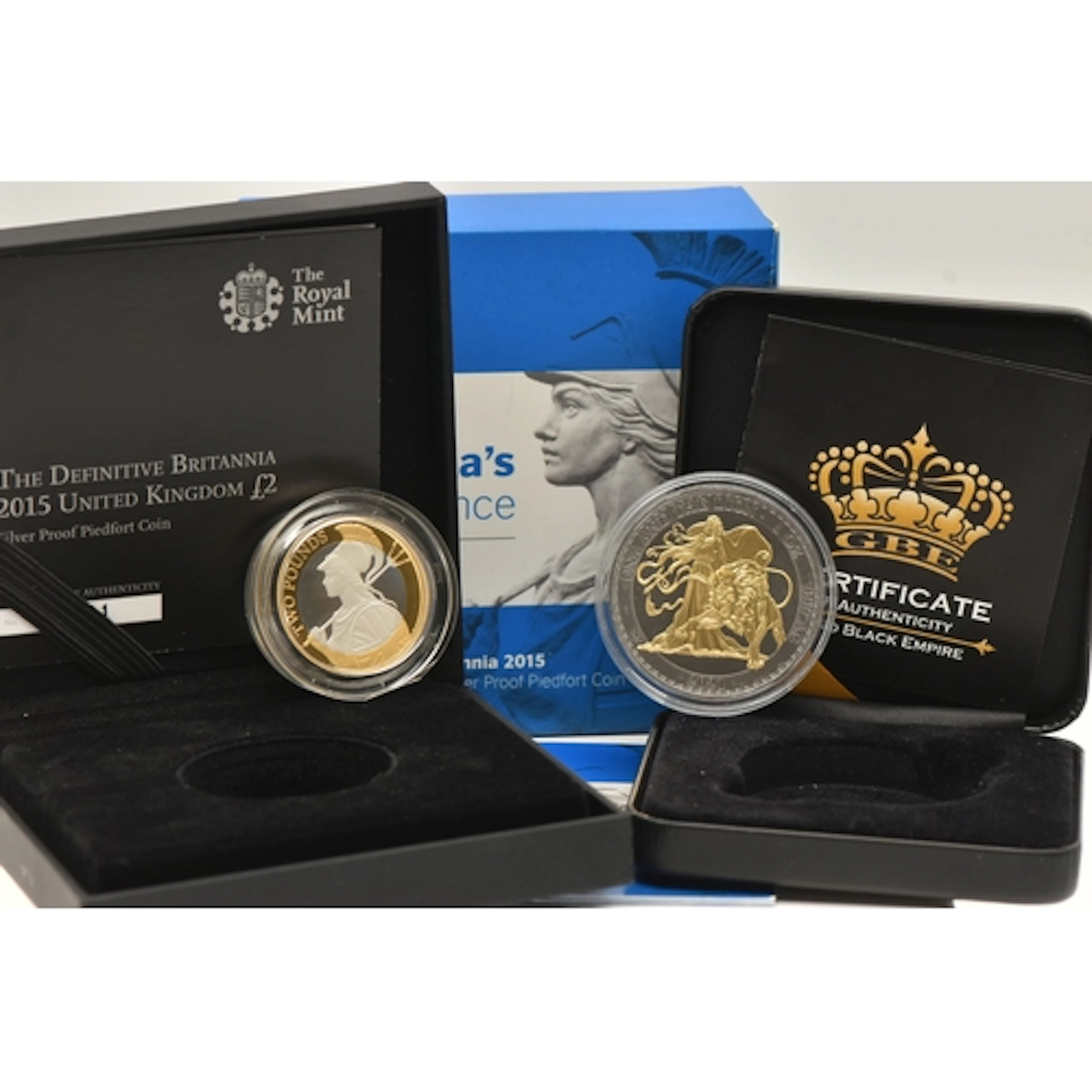 TWO BOXED COINS, to include a boxed 'Royal Mint' Britannia's...