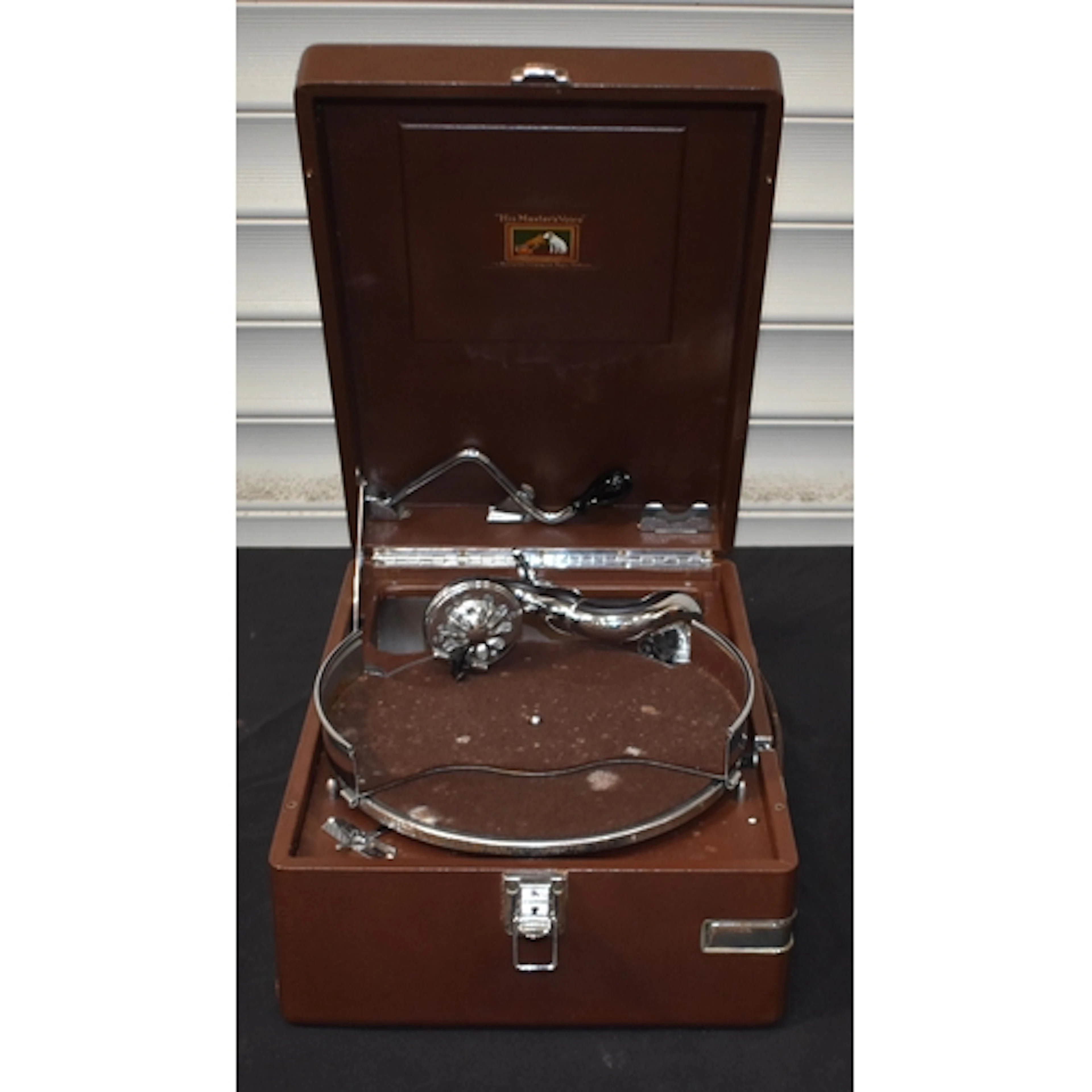 A cased His Master's Voice portable Gramophone 16 x 41 x 28c...