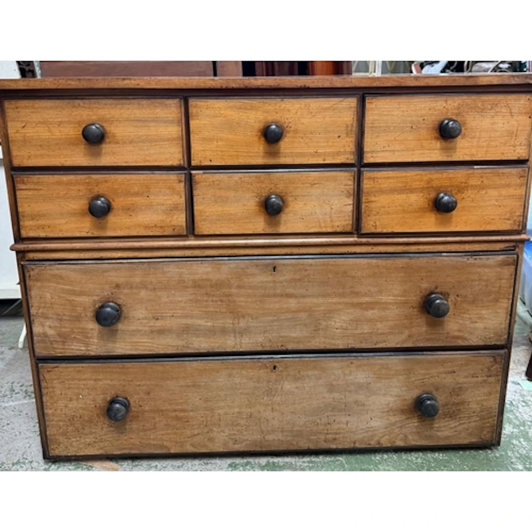 A Victorian chest of drawers , features an arragement of sho...