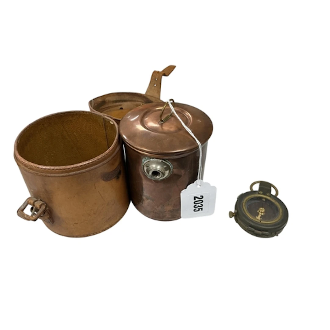A campaign copper shaving mug with burner contained within a...
