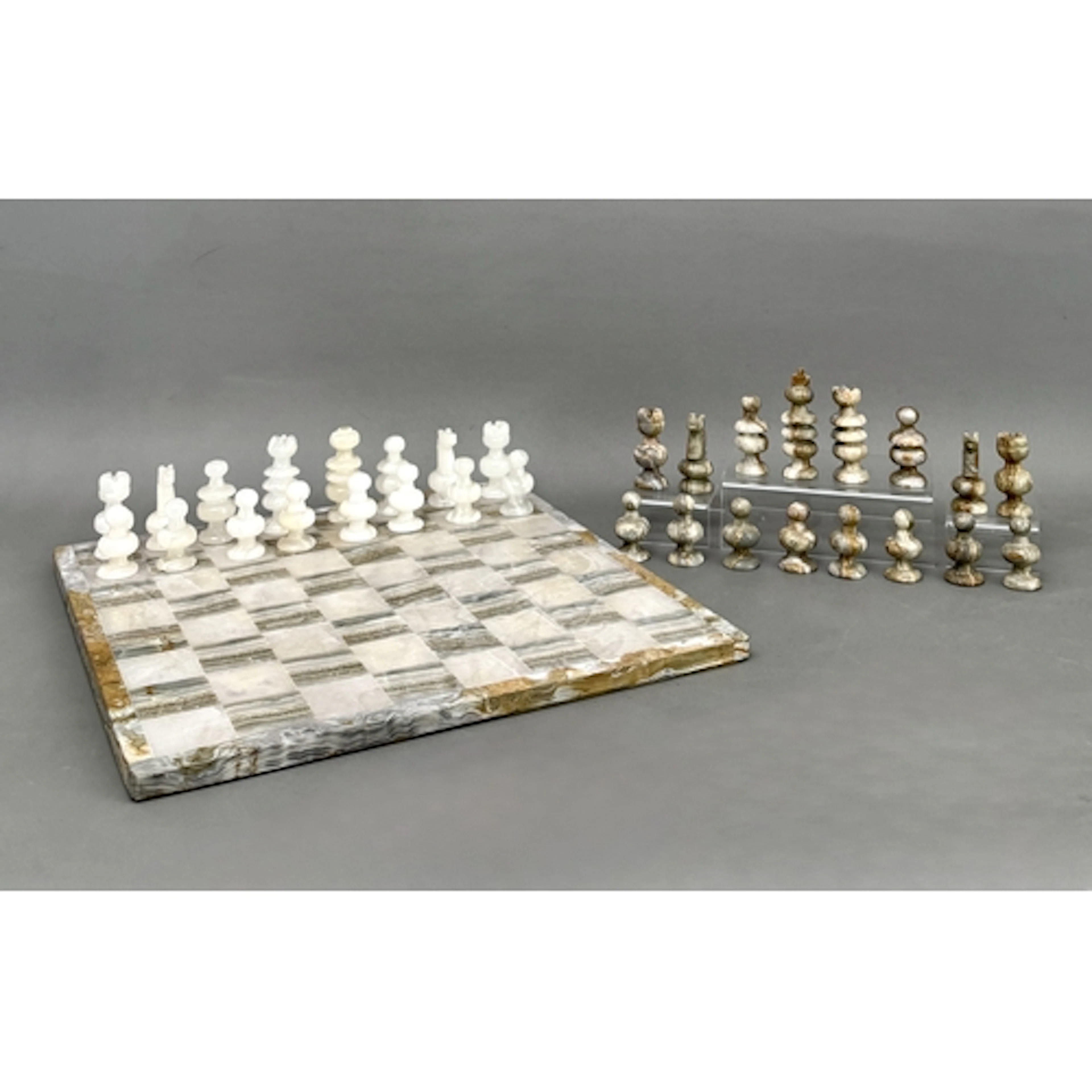 An onyx chess set and board - the board measuring 35 x 35cm.