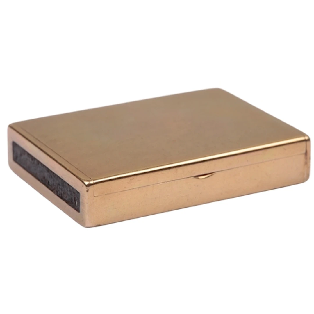 Asprey a 9ct gold vesta case, circa 1921, the plain rectangu...