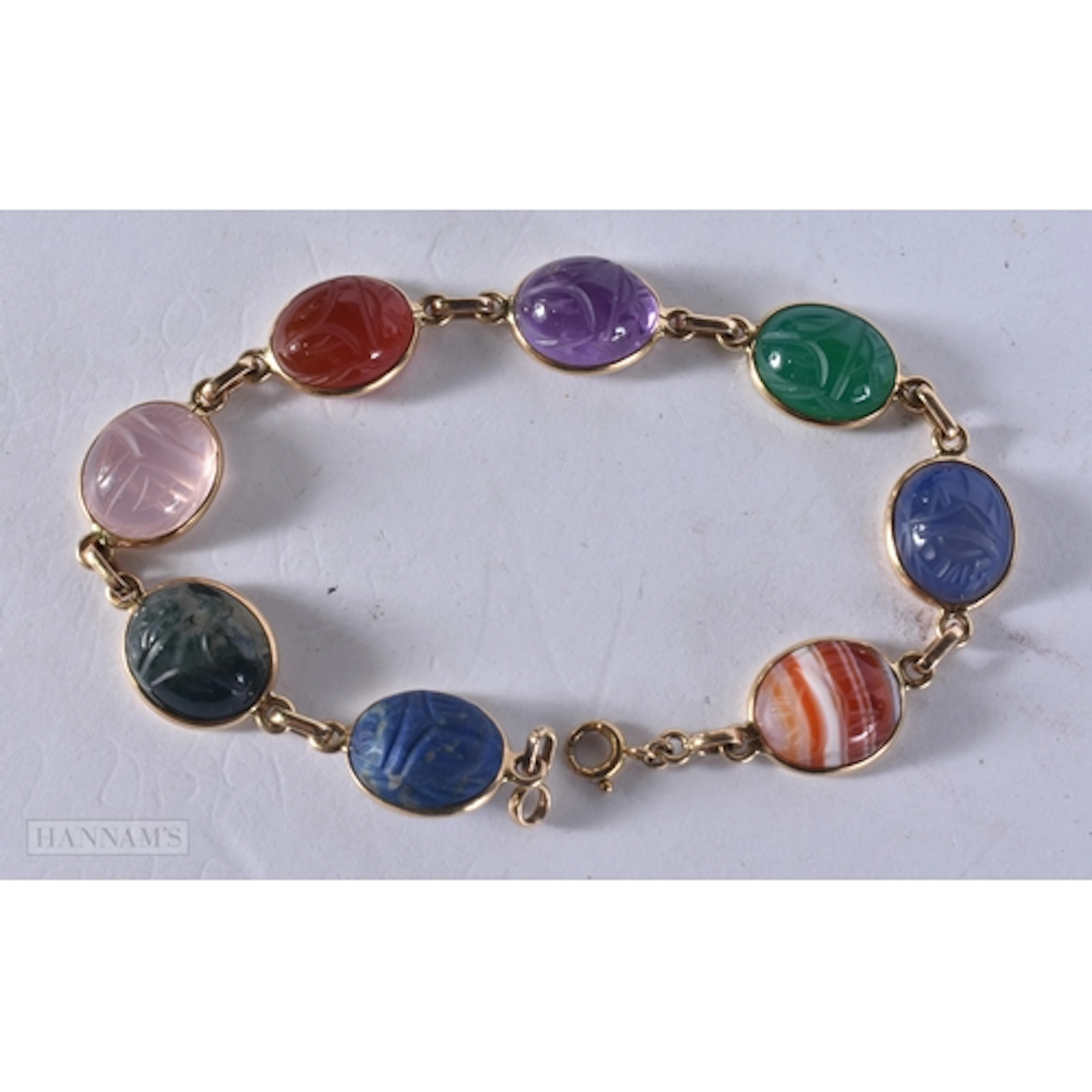 9ct gold carved scarab beetle Mult gemstone bracelet. set wi...