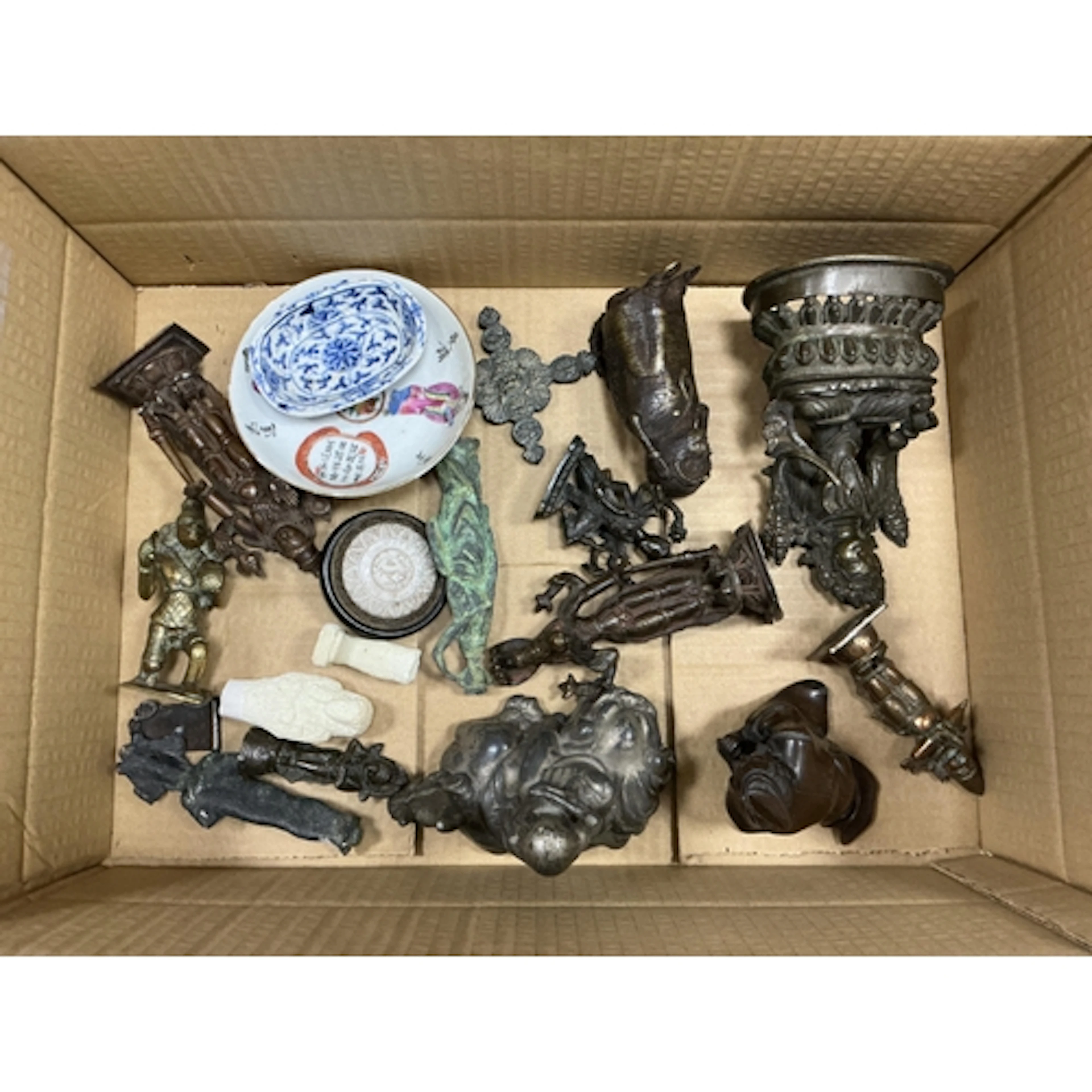 A collection of eleven 19th century and later bronze and bas...