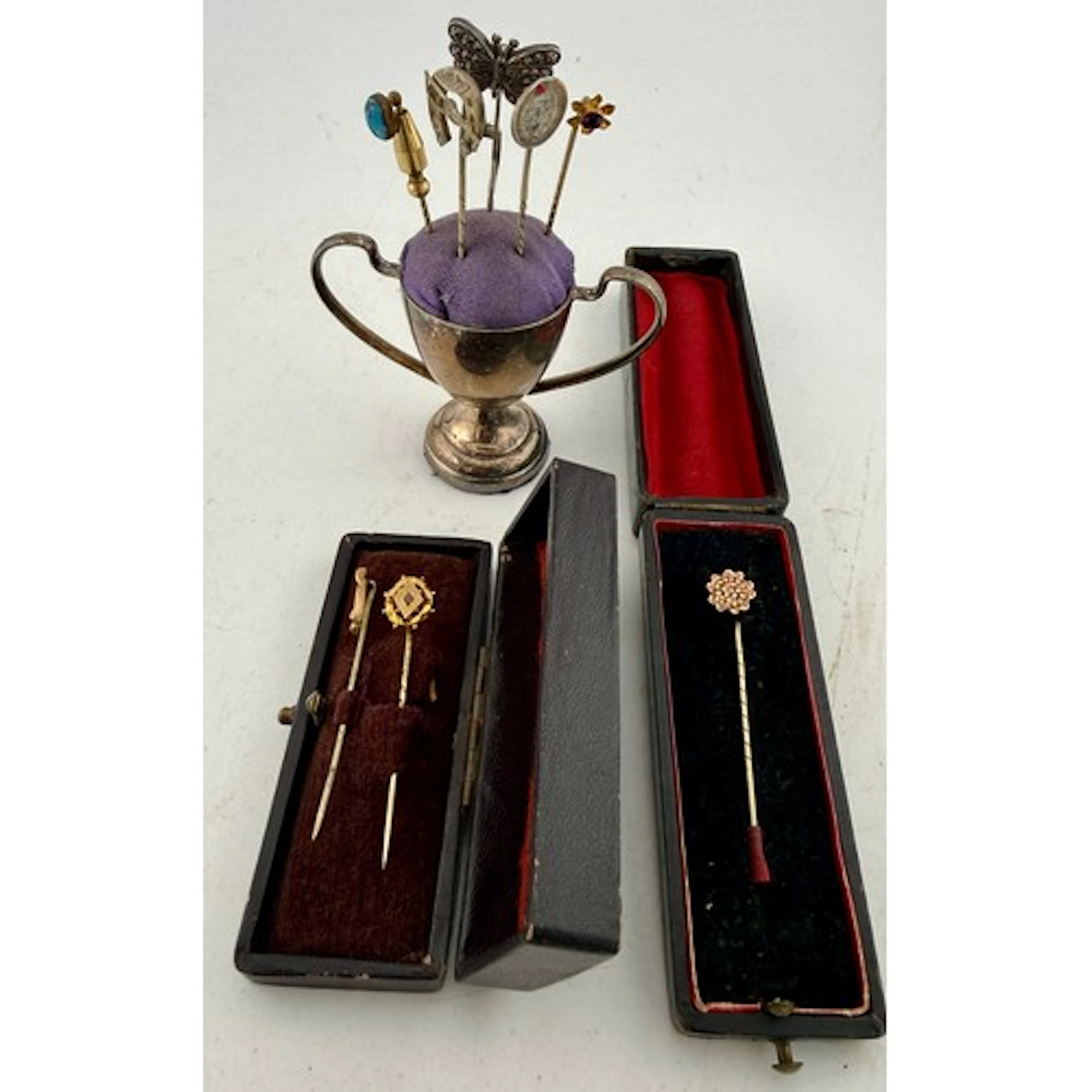 Early 20thC stick pins to include one marked 9 carat gold se...