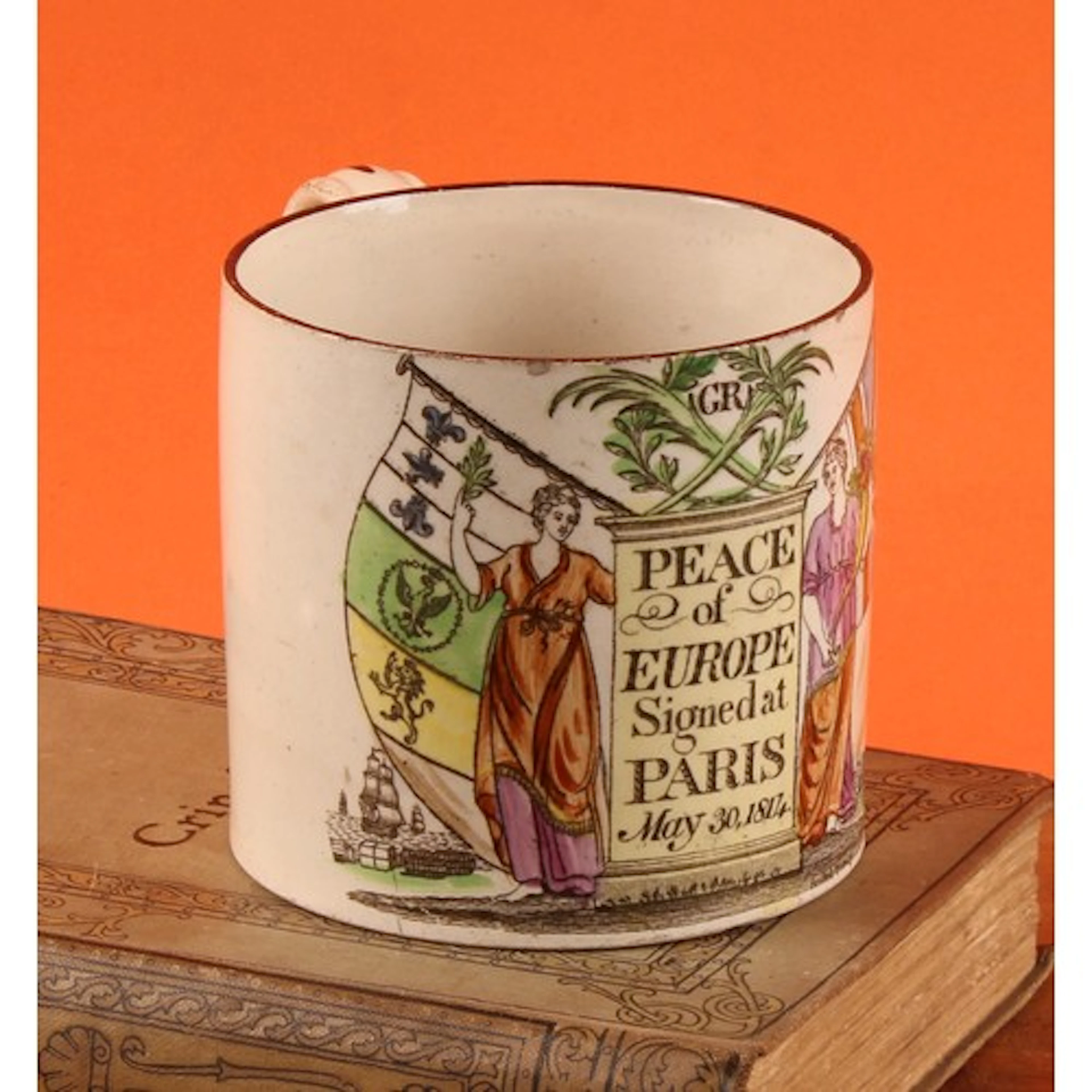 The Napoleonic Wars - a Bristol Pottery commemorative mug, i...