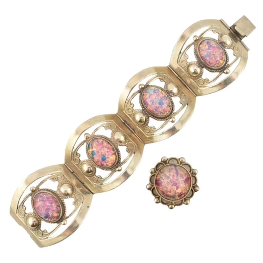 A vintage Mexican bangle and ring set. The ring set with sim...