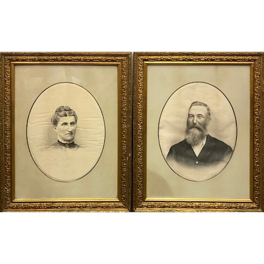 A pair of Victorian portraits, a lady and a gentleman, grisa...