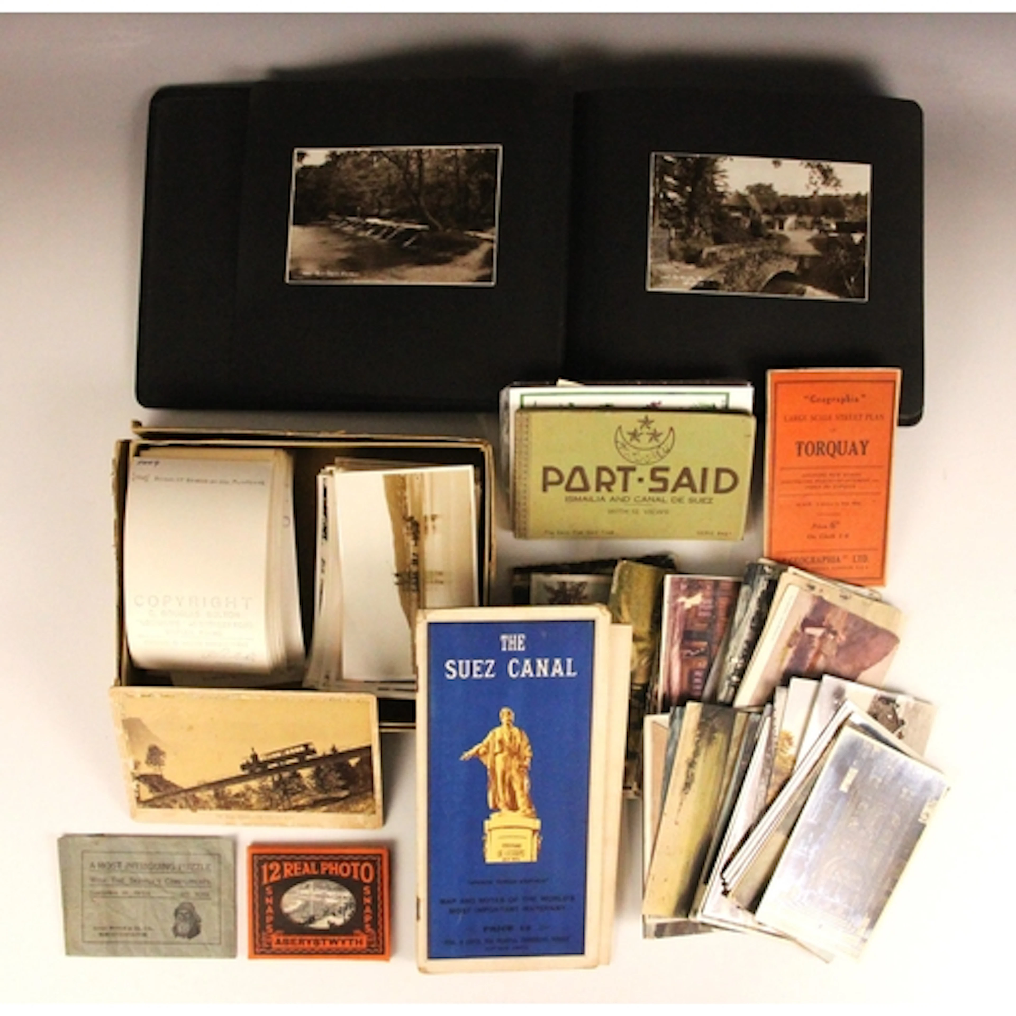A collection of loose postcards, early 20th century and late...