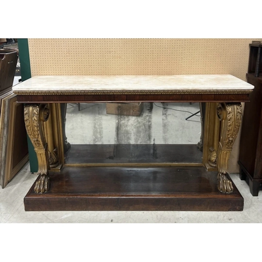 A REGENCY ROSEWOOD AND CARVED GILT WOOD CONSOLE TABLE With w...