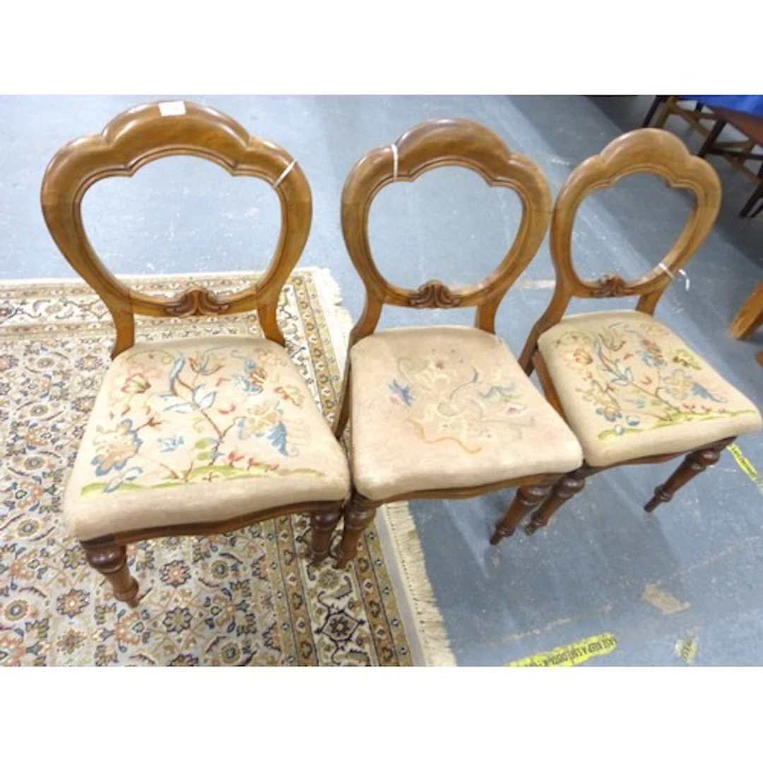 Set of three antique balloon back style dining chairs.