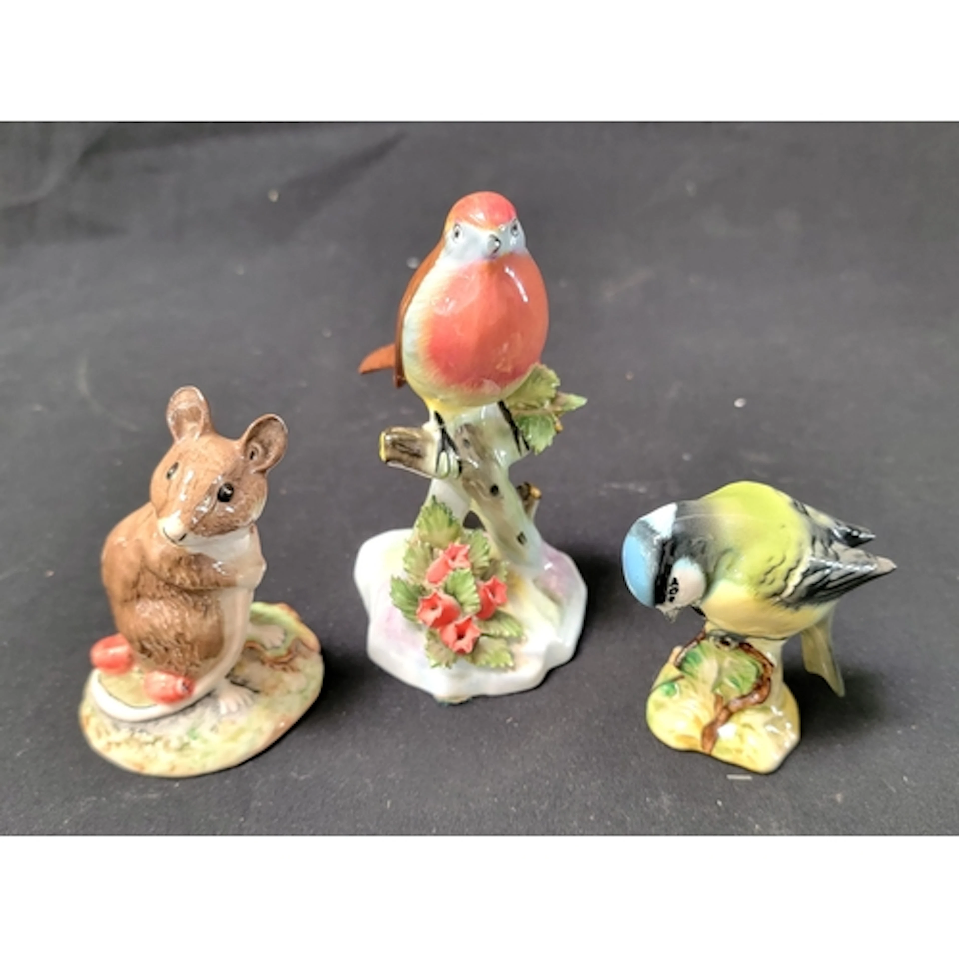 TWO BESWICK ENGLAND ANIMAL FIGURINES comprising a Blue Tit ...