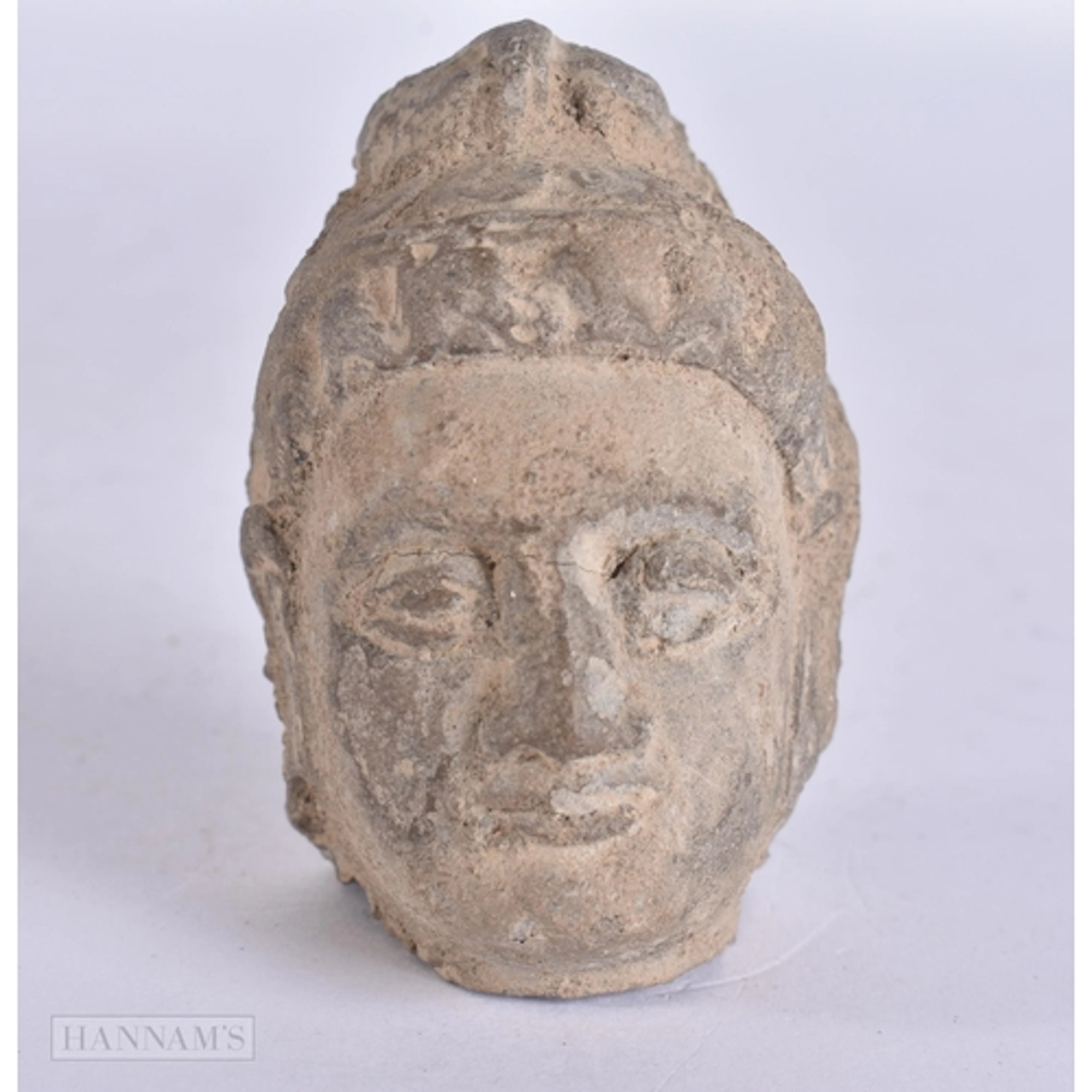 AN EARLY INDIAN GANDHARA SCHIST STONE HEAD. 6.5 cm x 4 cm.