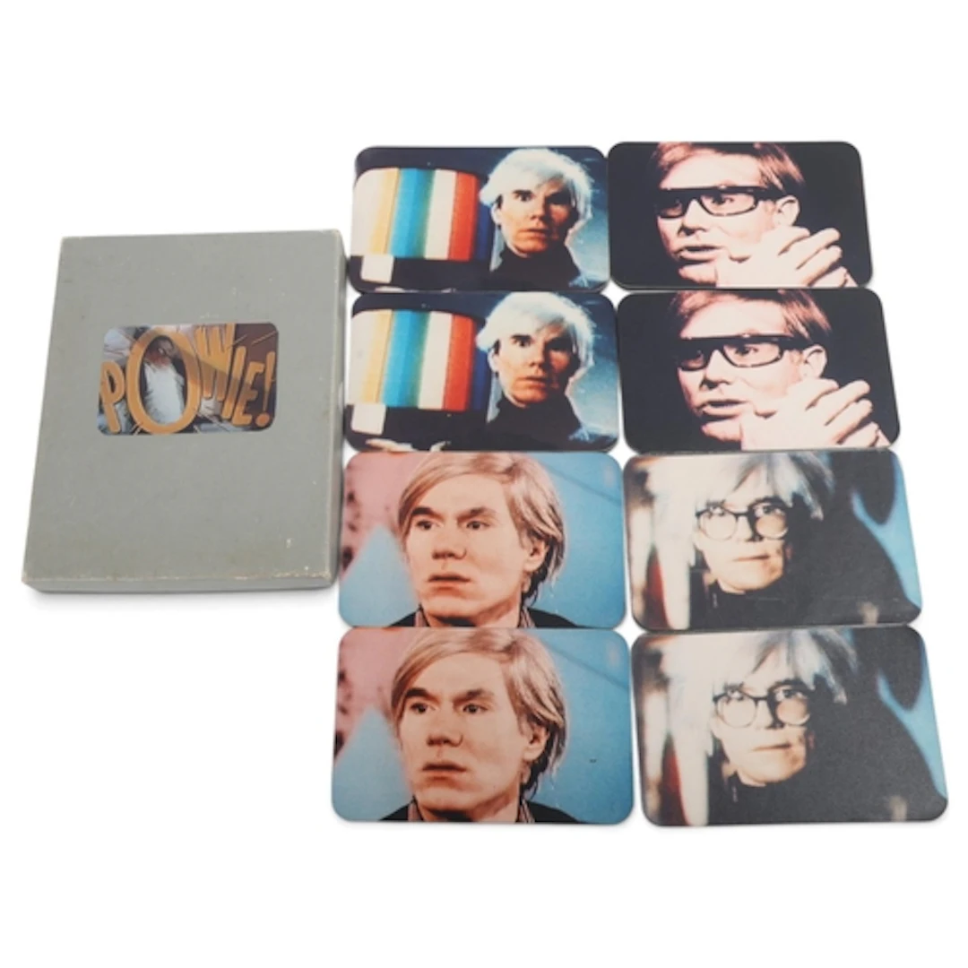 A set of 8 coasters featuring portraits of ANDY WARHOL, in "...