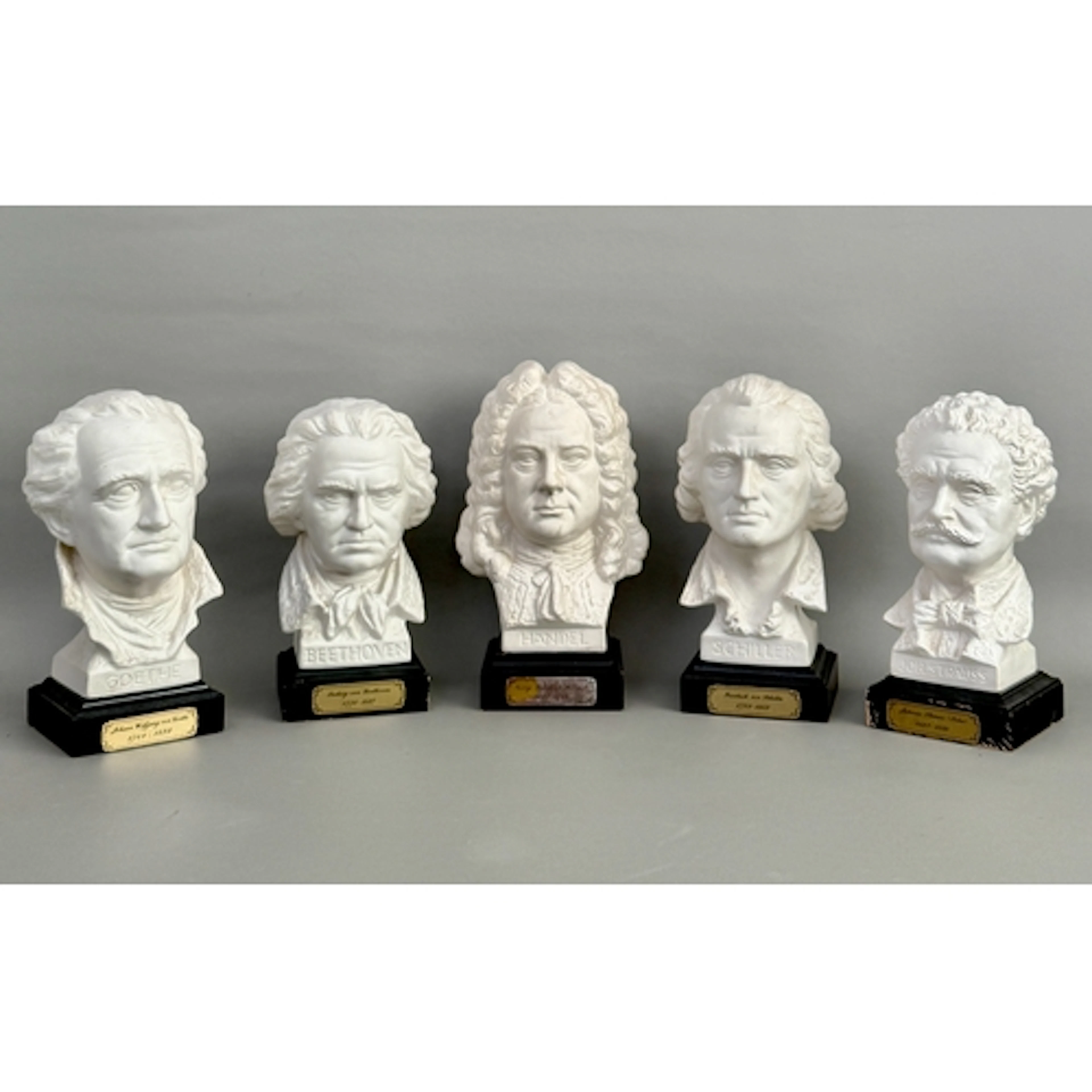 A collection of five white bisque busts of composers - by Go...