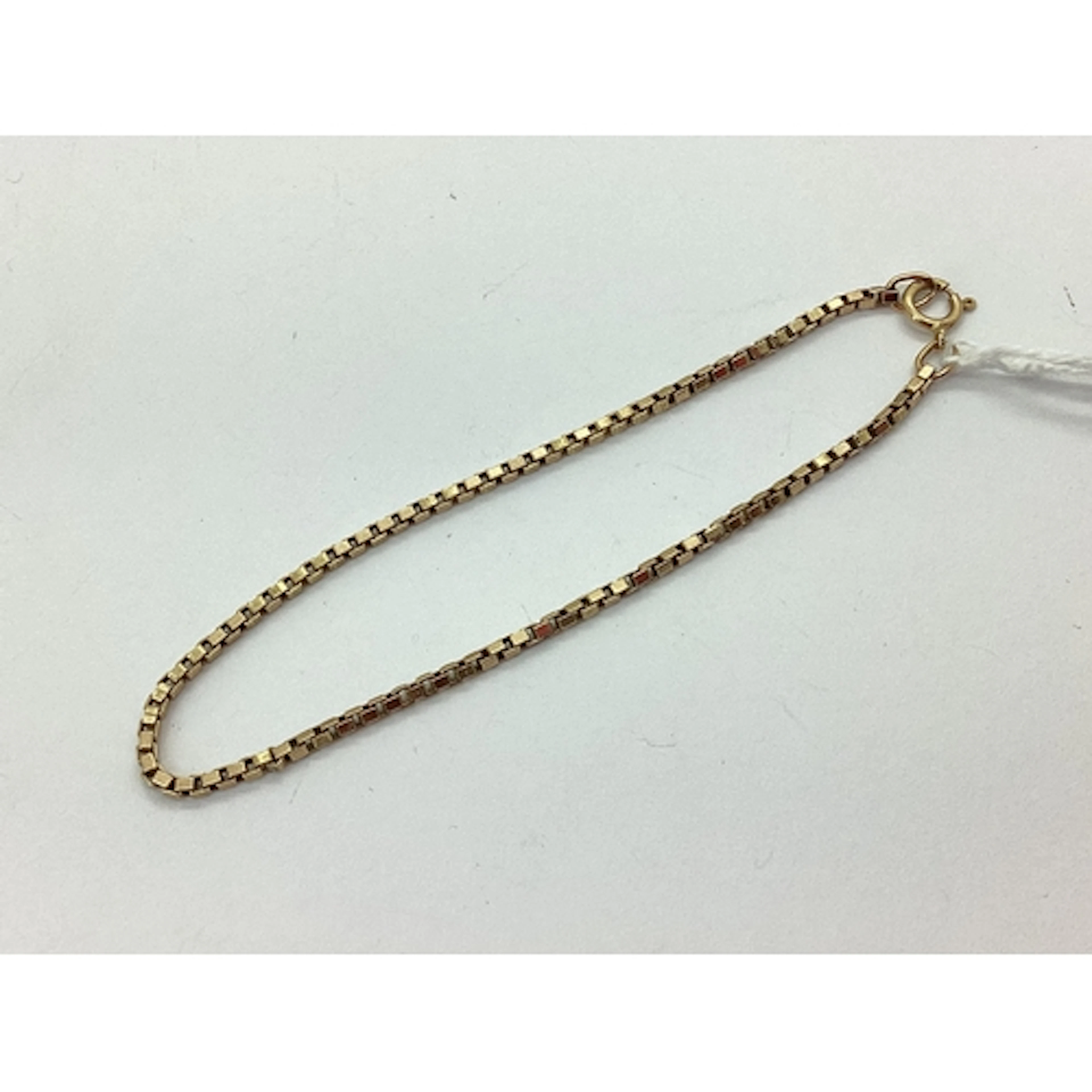 A Box Link Bracelet, approximately 18cm long, to clasp stamp...