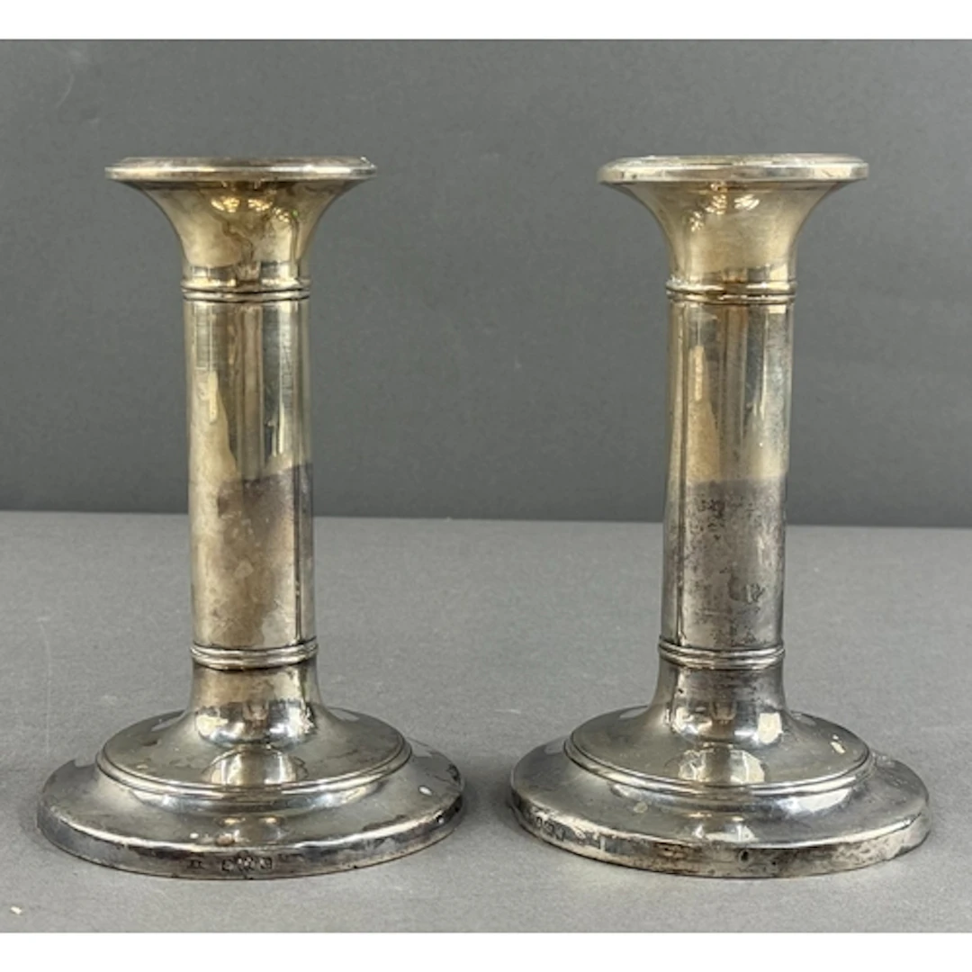 Silver: a pair of simplistic loaded candlesticks by IS Green...