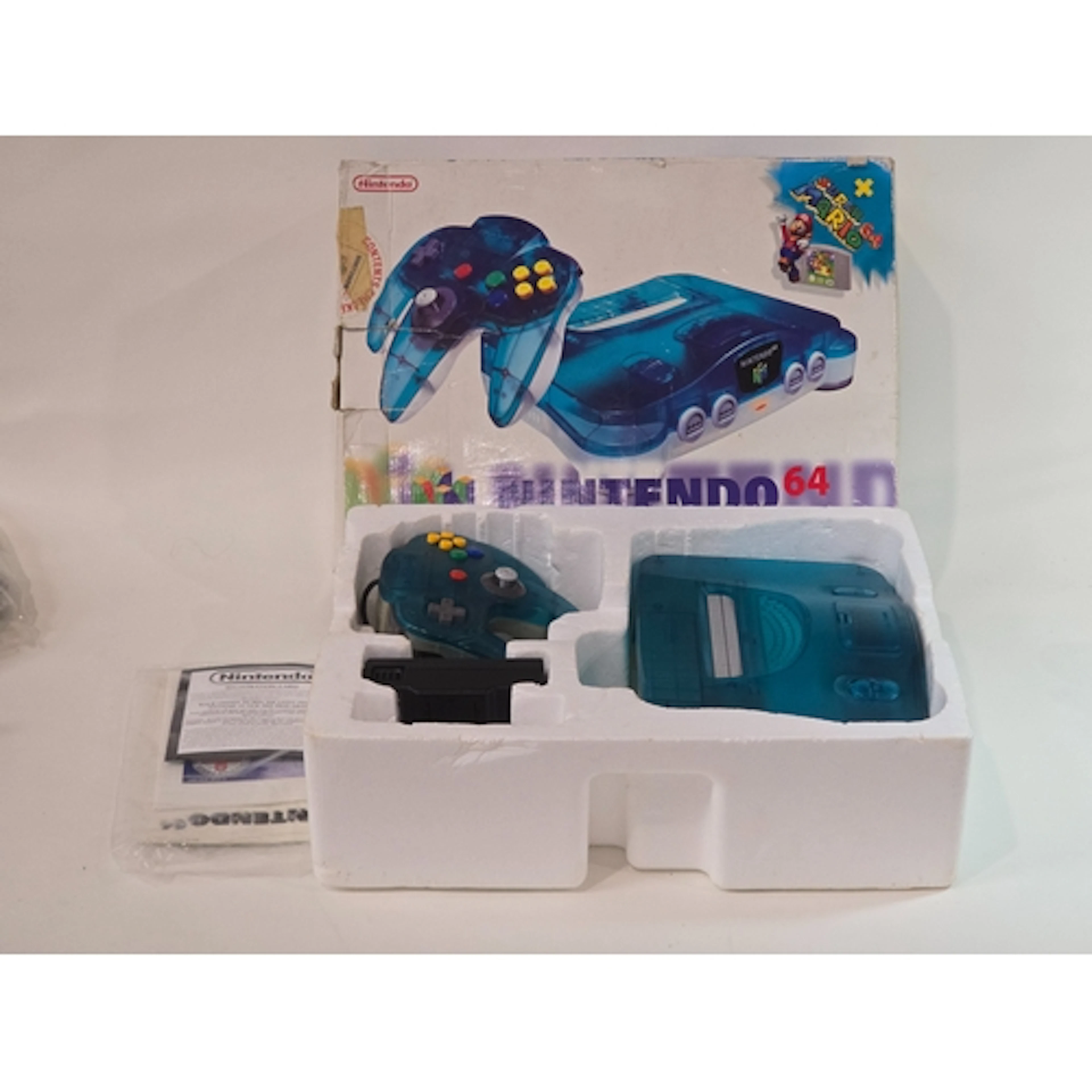 Vintage Nintendo 64 Clear Blue boxed console. Appears 90% co...