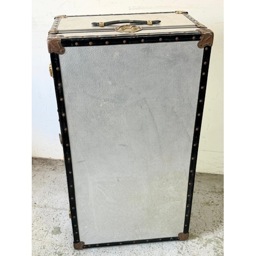 A Metal and aluminium travel trunk