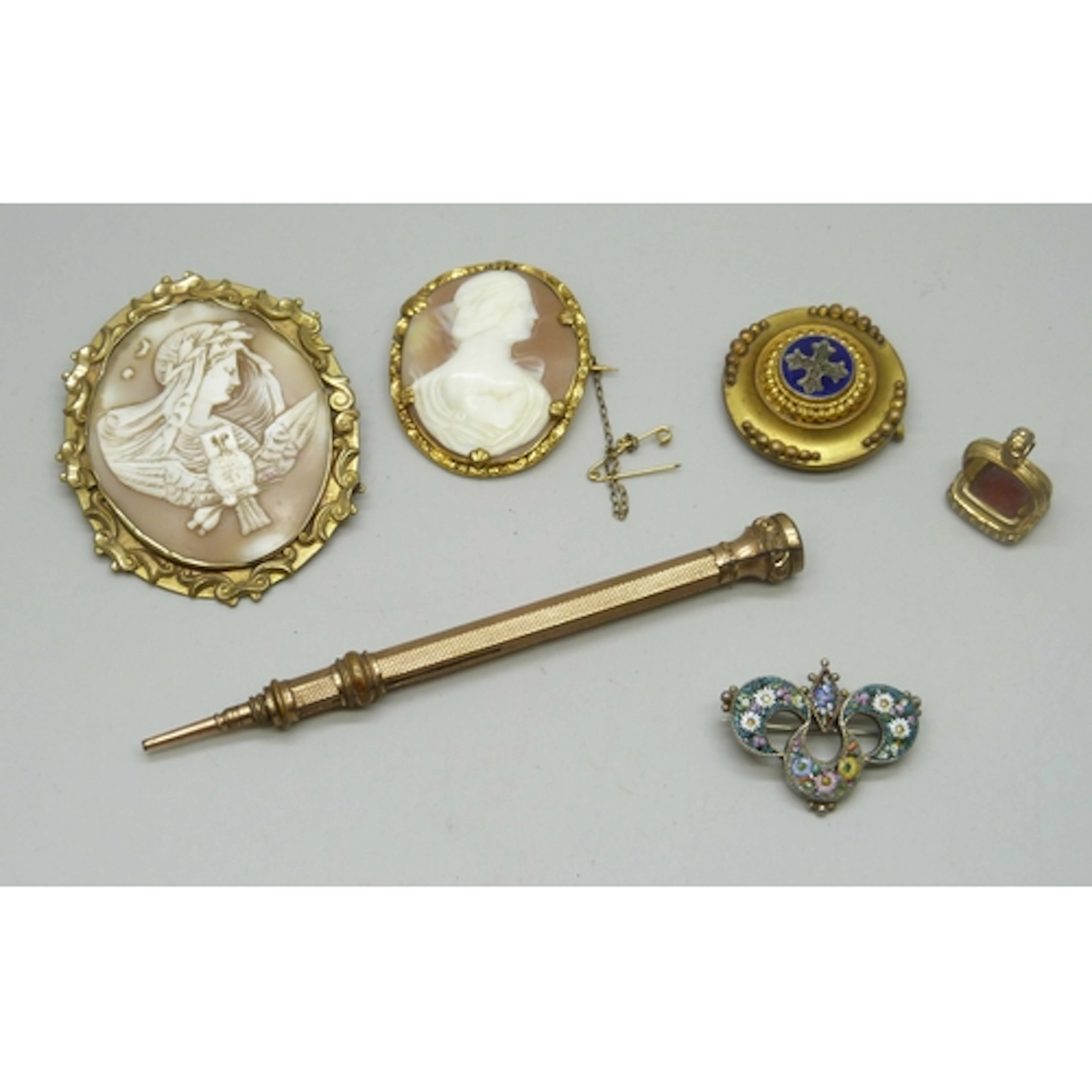 A gilt framed cameo brooch depicting Athena with an owl, 6.5...