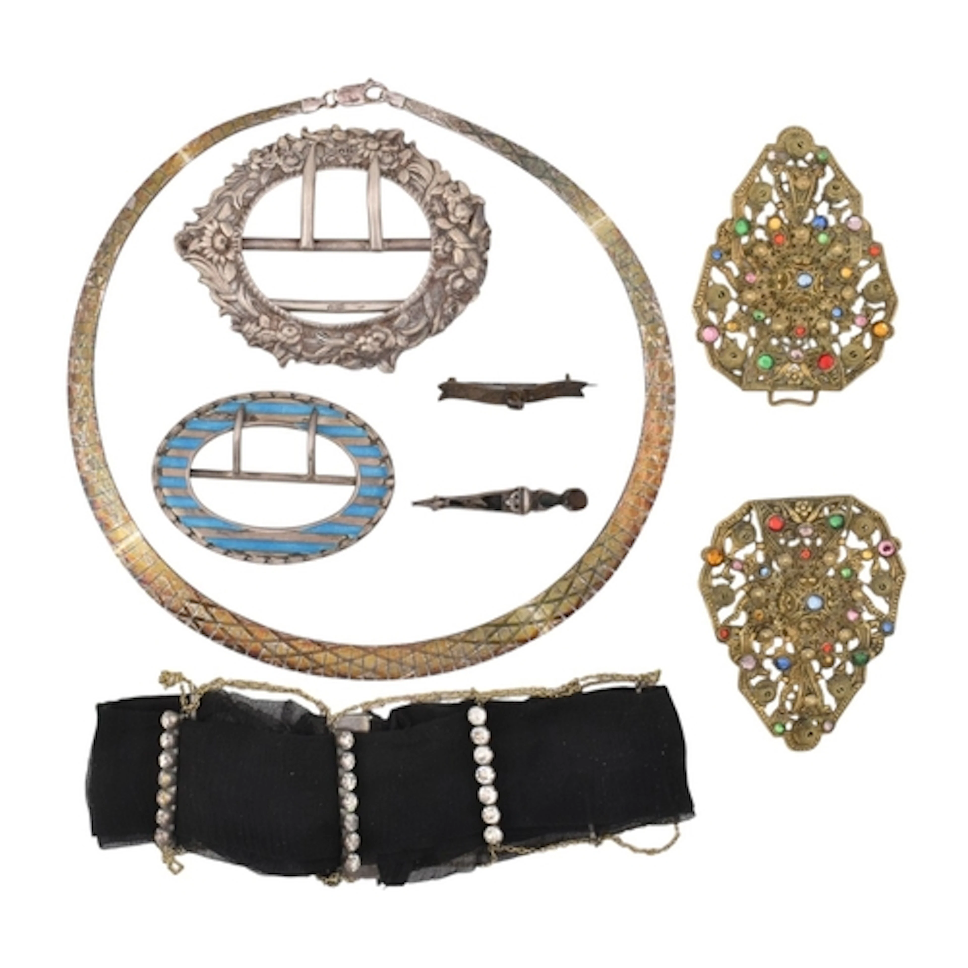 A collection of buckles and brooch pins. The buckles to incl...