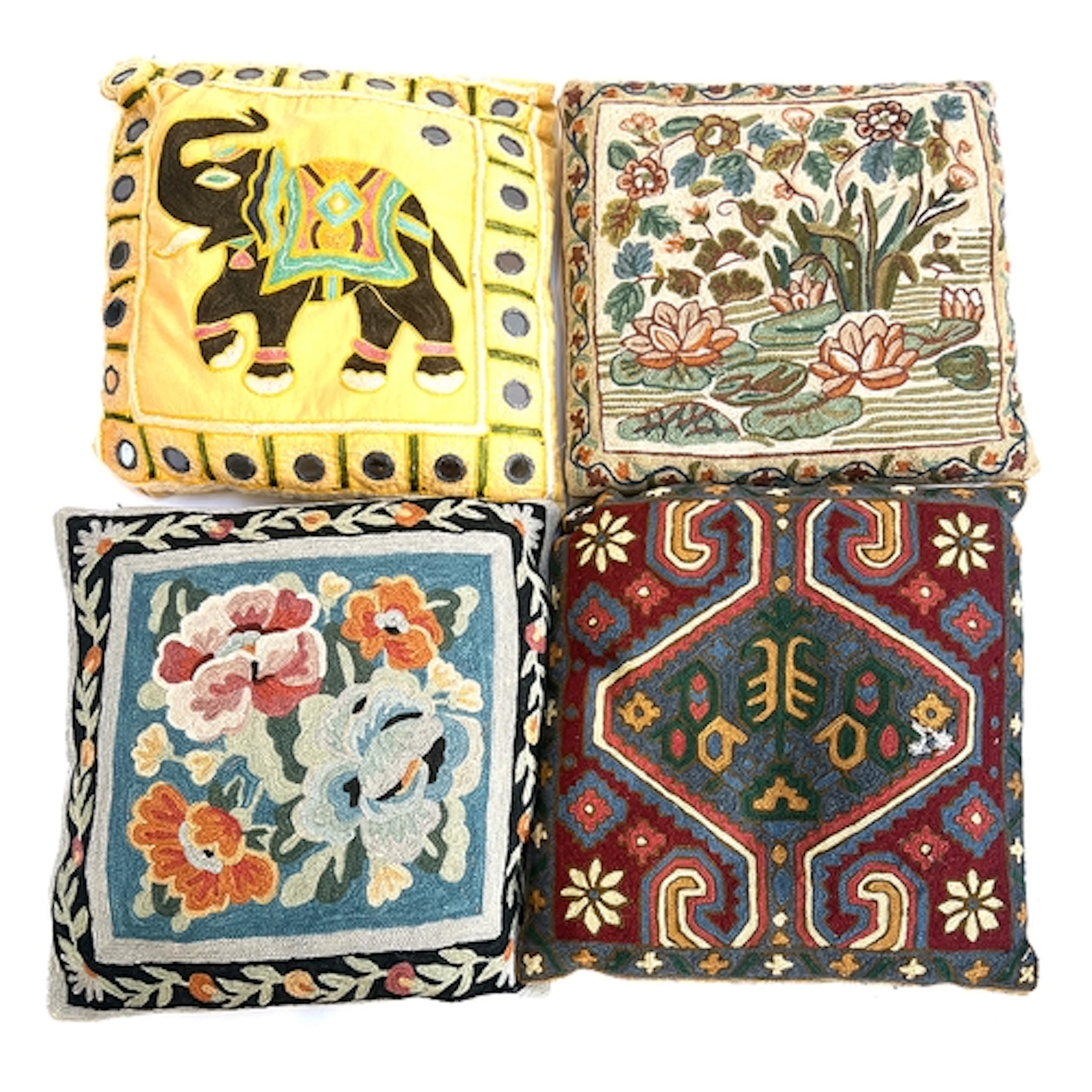 A lot of four crewel work style chain stitch cushions, one w...