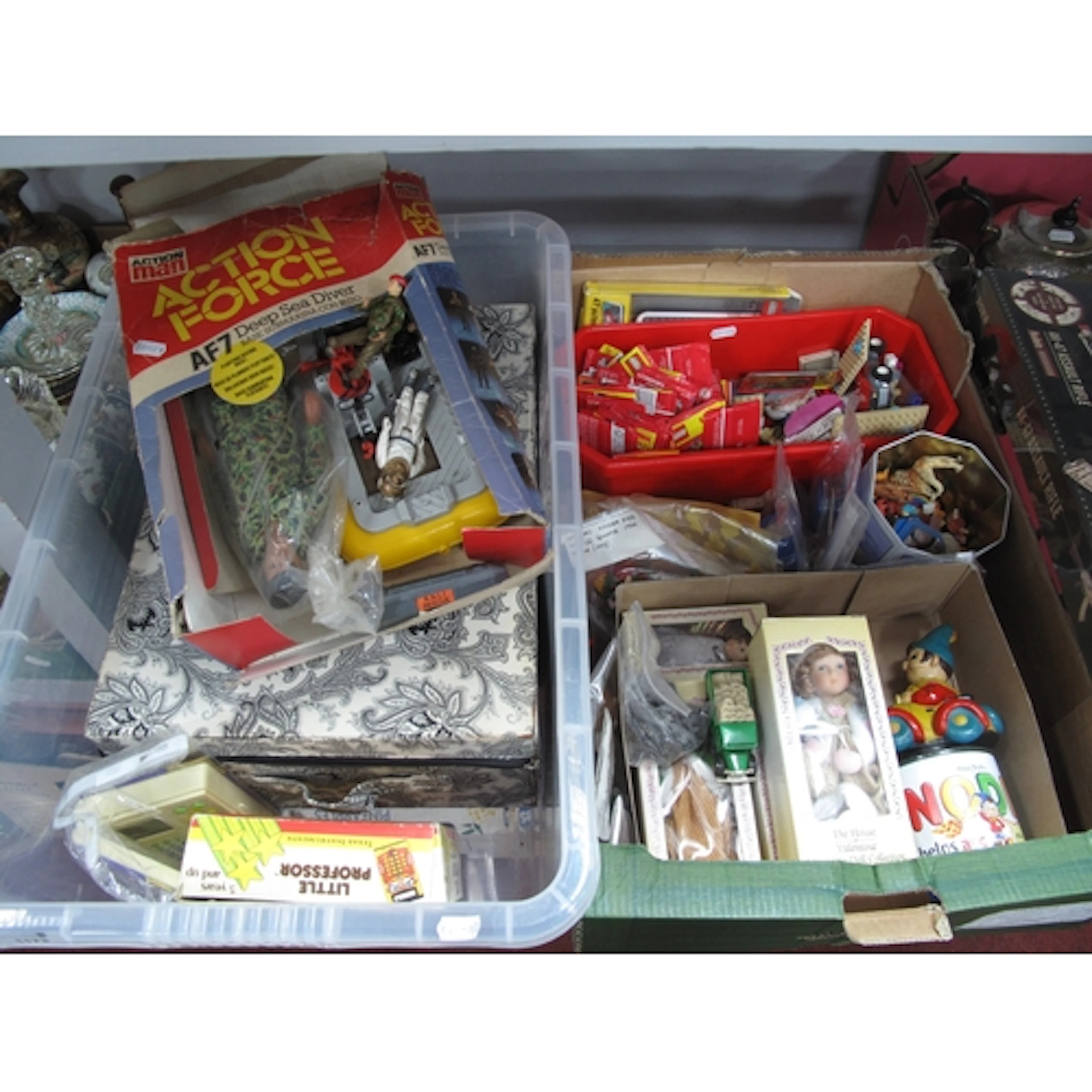 Mixed toys, including a sealed ROKR "AK-47 Justice Guard Ass...