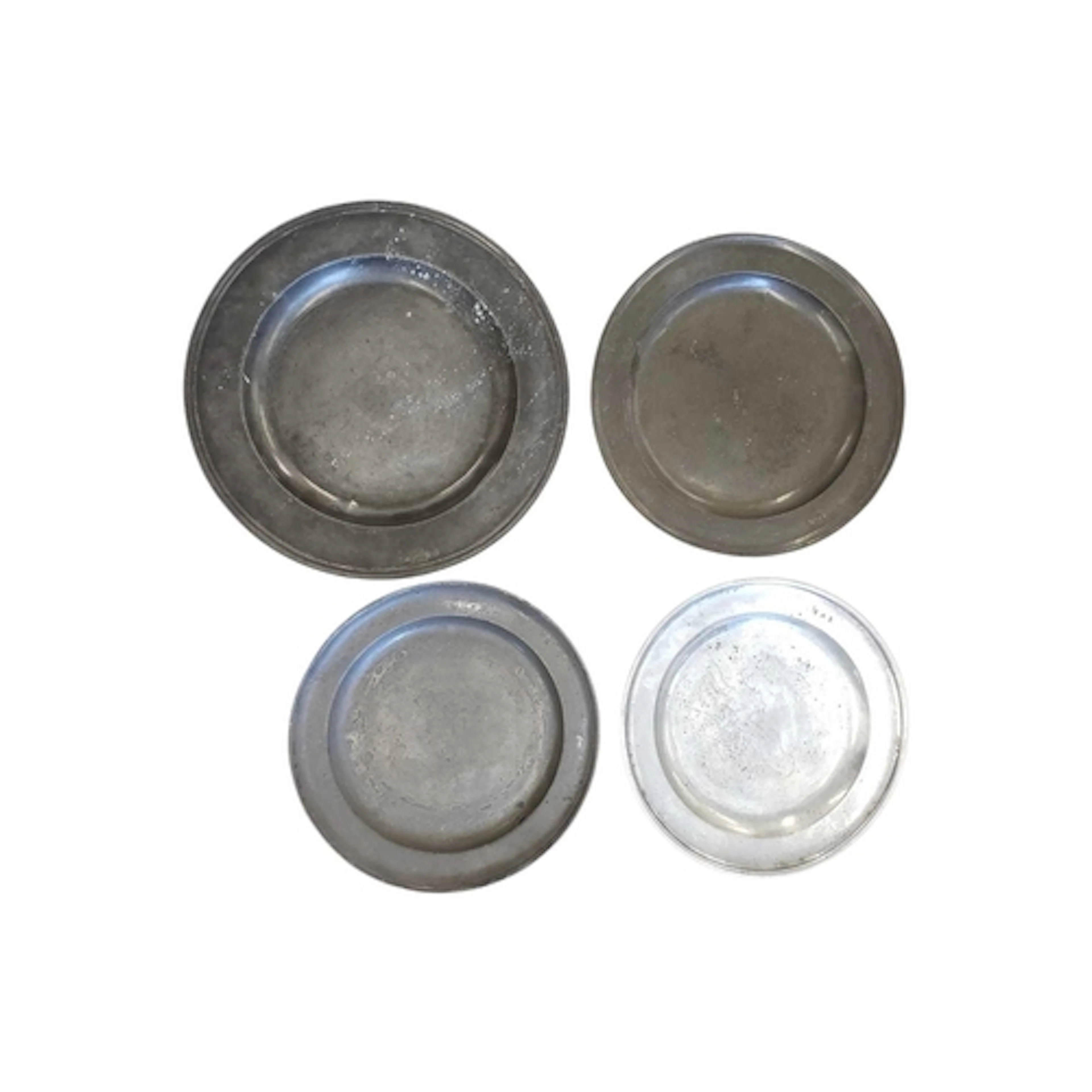Four 18th & 19th century pewter chargers. Each piece wit...