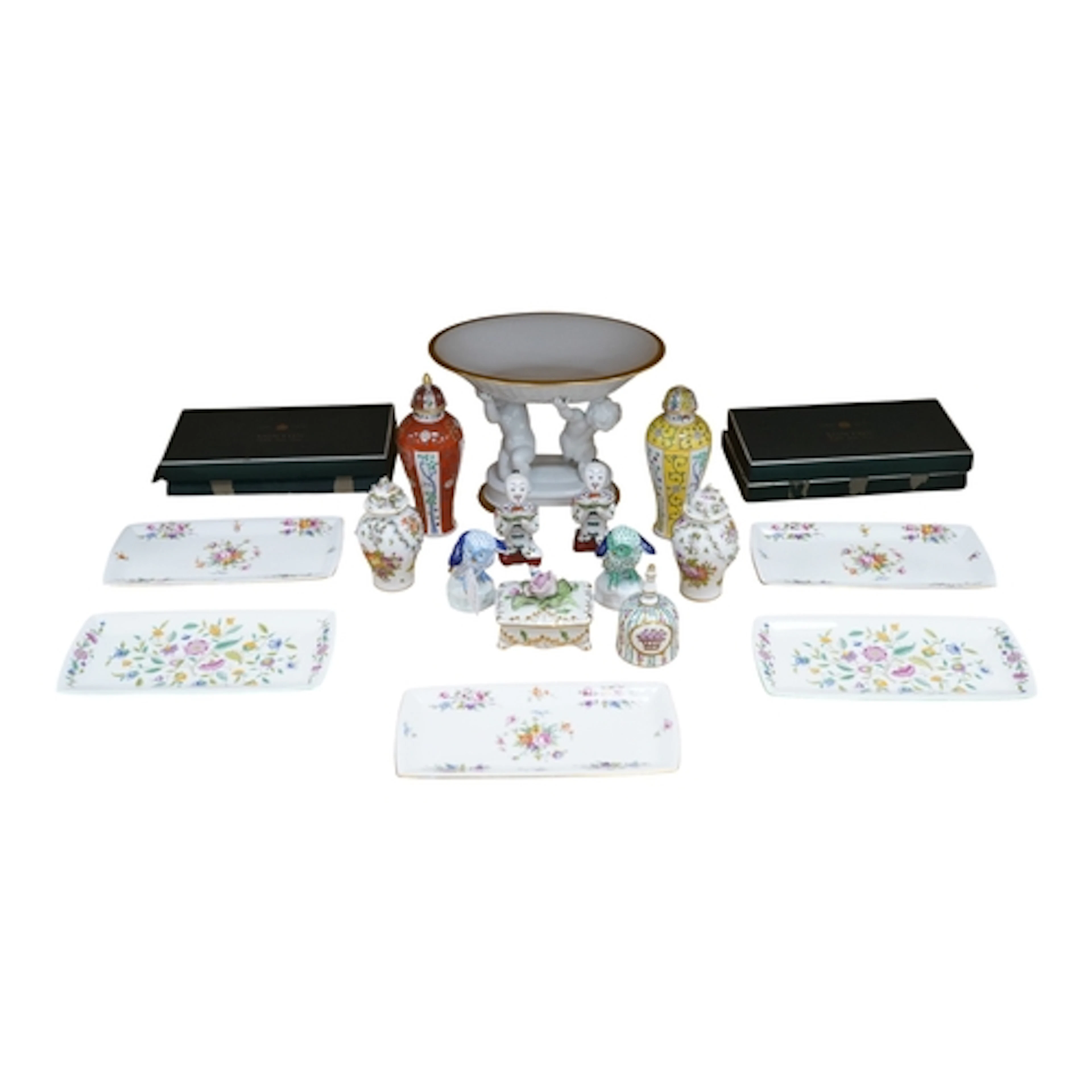 A collection of decorative ceramics, including assorted Here...