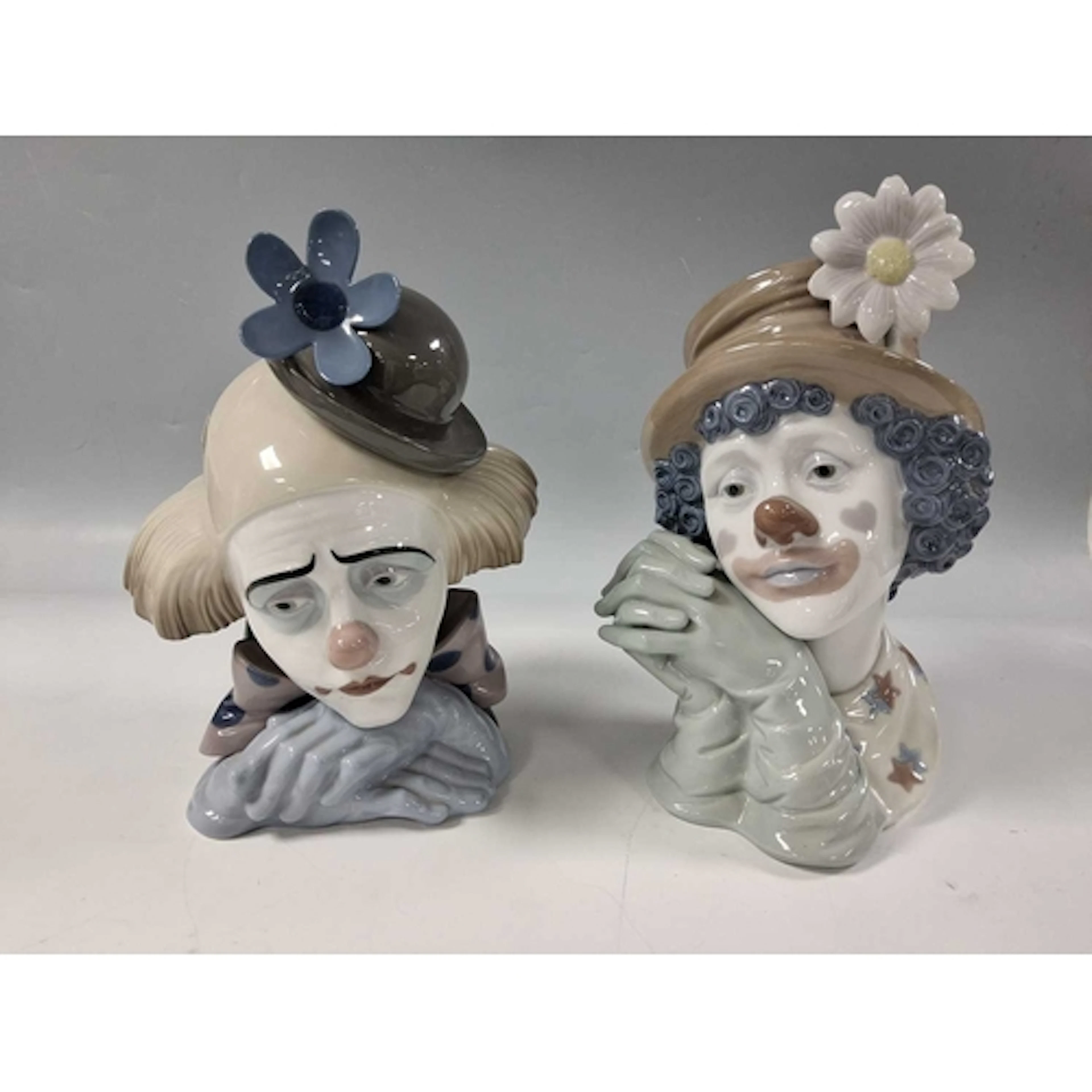 TWO BOXED LLADRO CLOWN BUSTS, comprising Pensive Clown, mode...