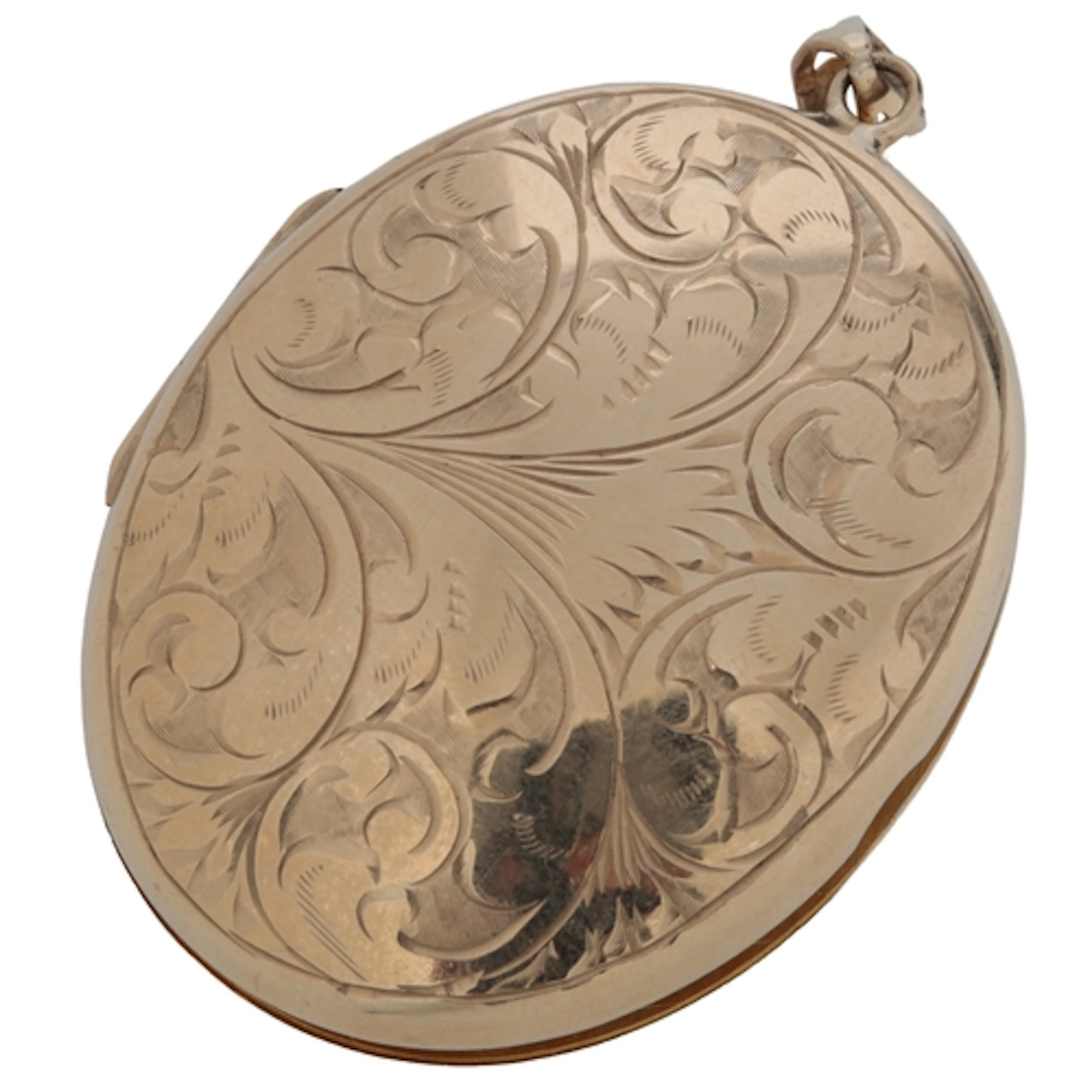A 9ct gold locket, circa 1973, of oval outline, engraved wit...
