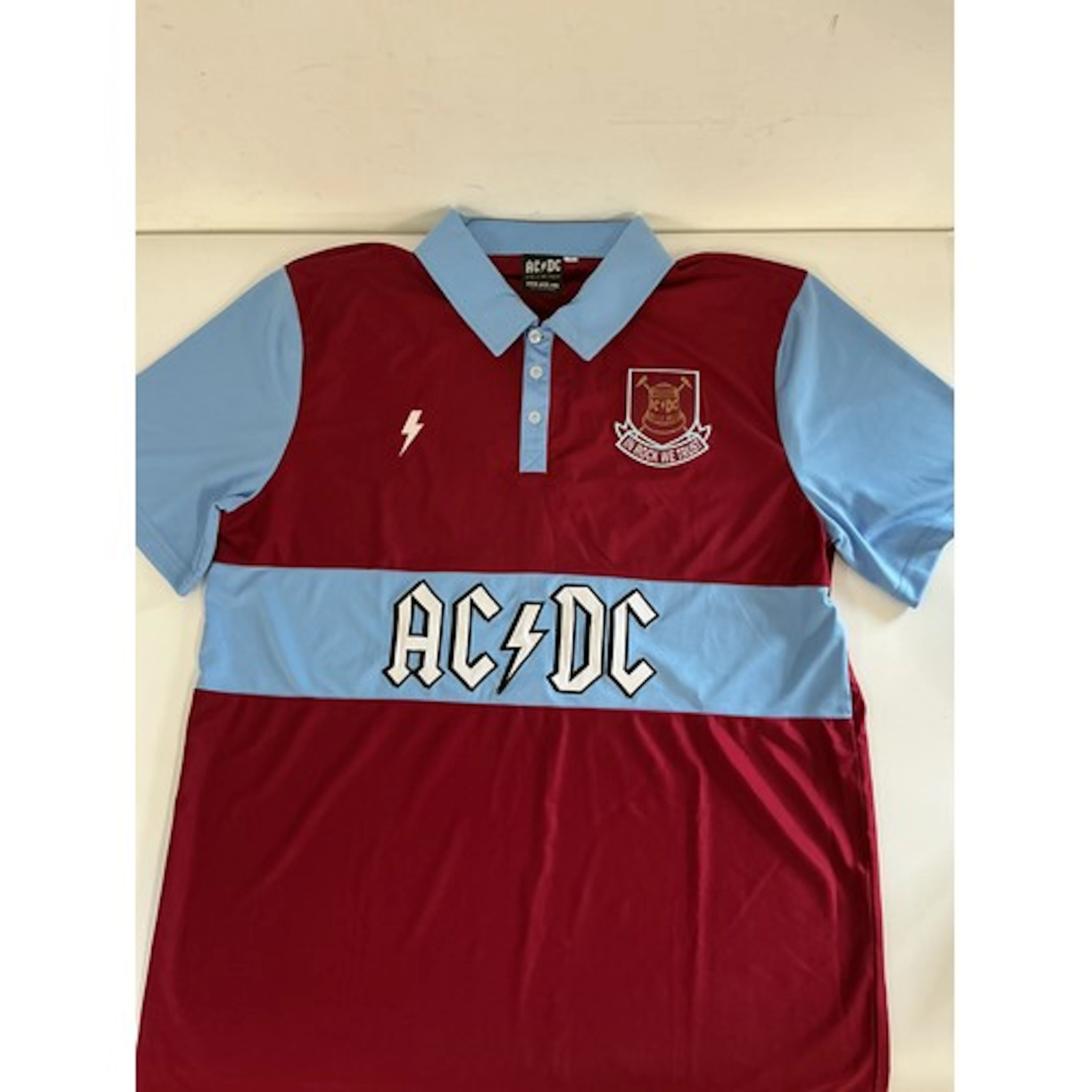 An AC/DC official merchandise West Ham Utd football shirt, s...