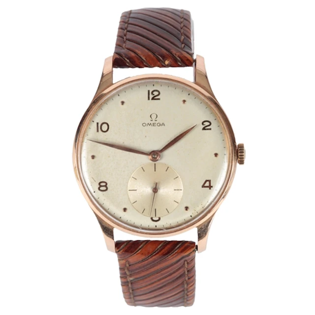 A gentleman's late 1940's 14k gold Omega jumbo manual wind w...