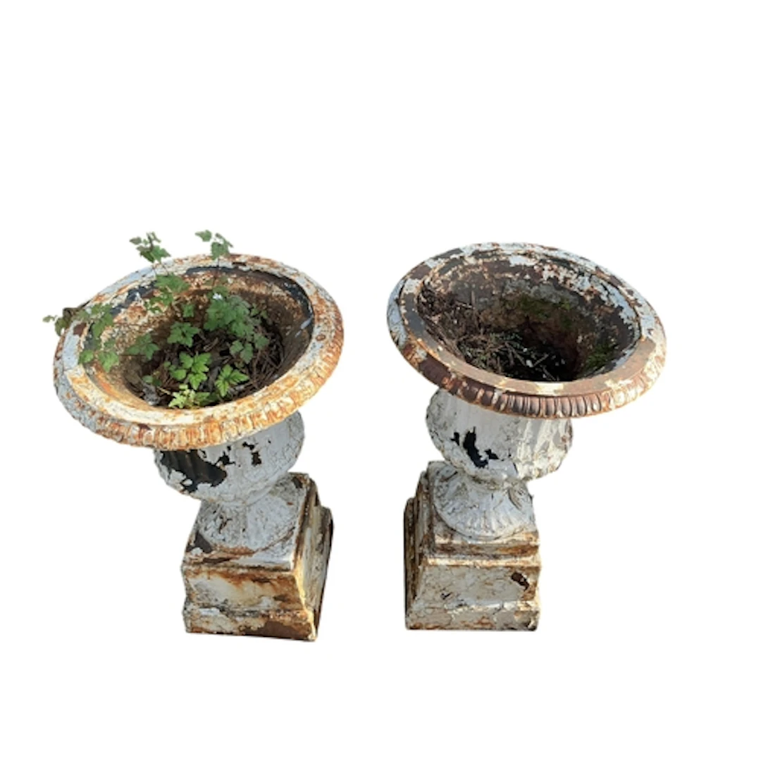 A pair of Victorian cast iron campana urns, height 68cm...